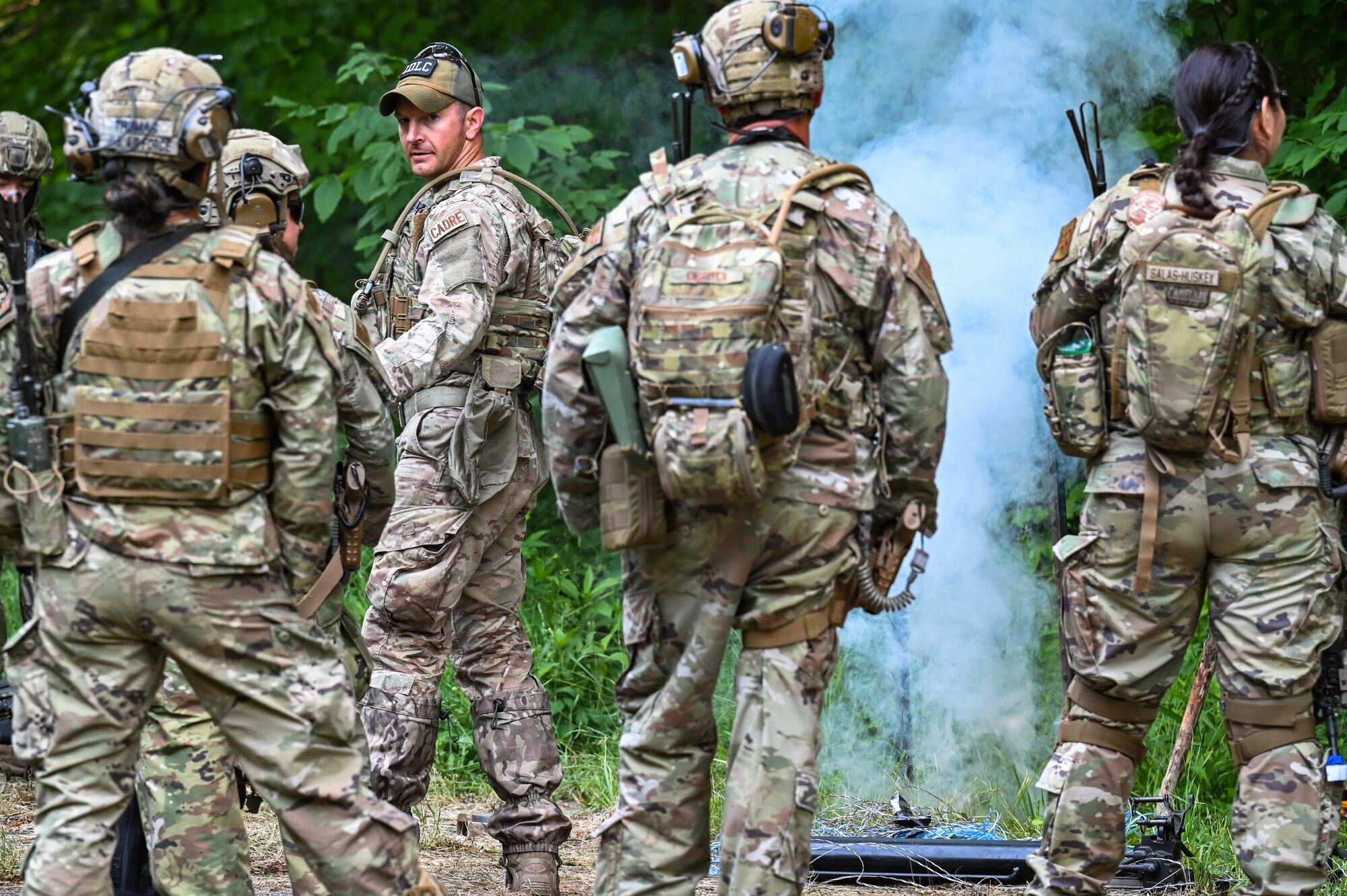Tech. Sgt. Anthony McDaniel, an Integrated Defense Leadership Course cadre member assigned to the 914th Security Forces Squadron, Niagara Falls Air Reserve Station, New York, demonstrates how an early warning device works on June 15, 2023, at Camp James A. Garfield Joint Military Training Center, Ohio.