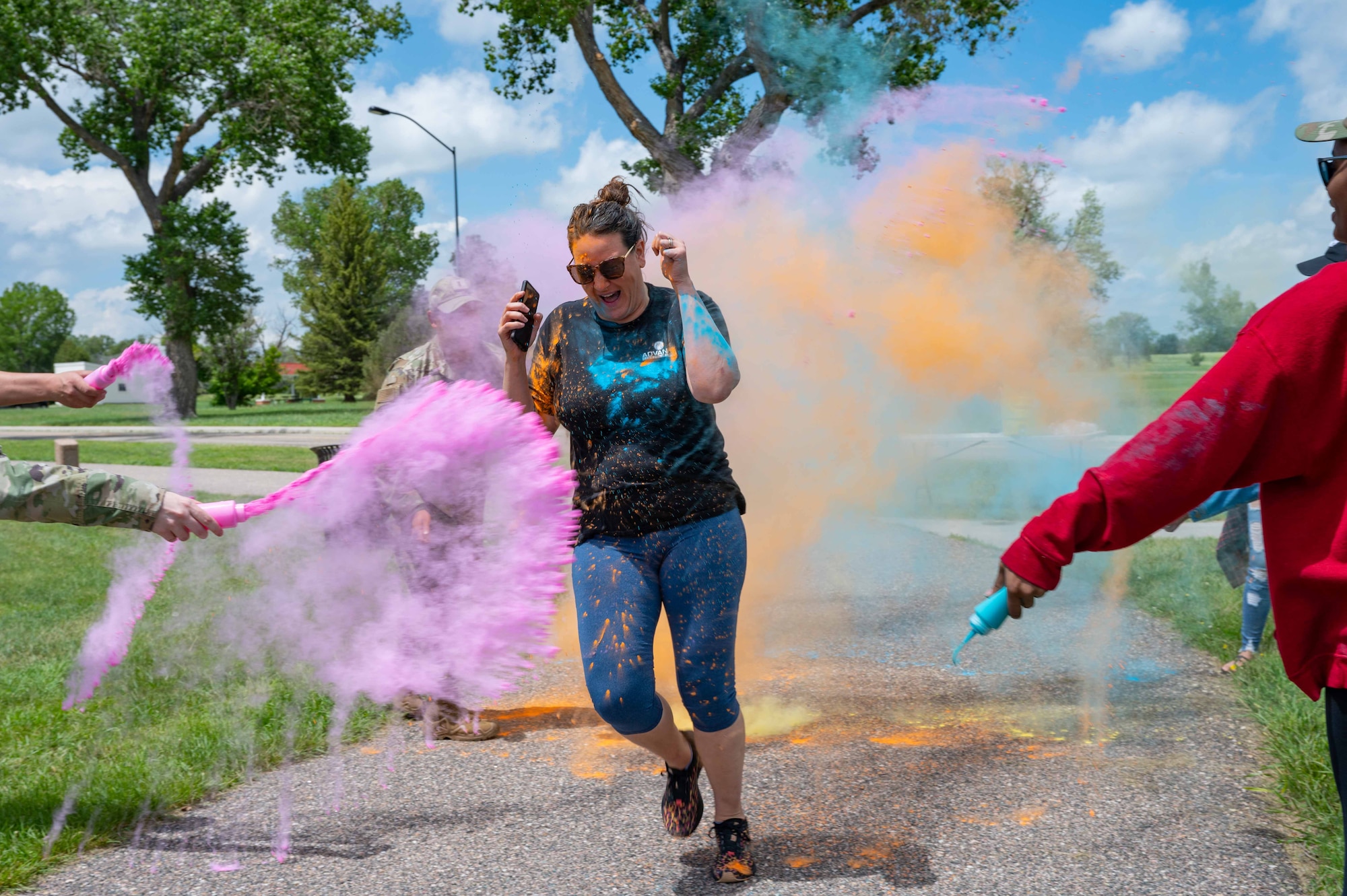 90th Missile Wing Airmen pose for a photo prior to a 5K color run at Argonne Parade Field on F.E. Warren Air Force Base, Wyoming, June 23, 2023. The color run was hosted to celebrate pride month. (U.S. Air Force photo by Senior Airman Sarah Post)