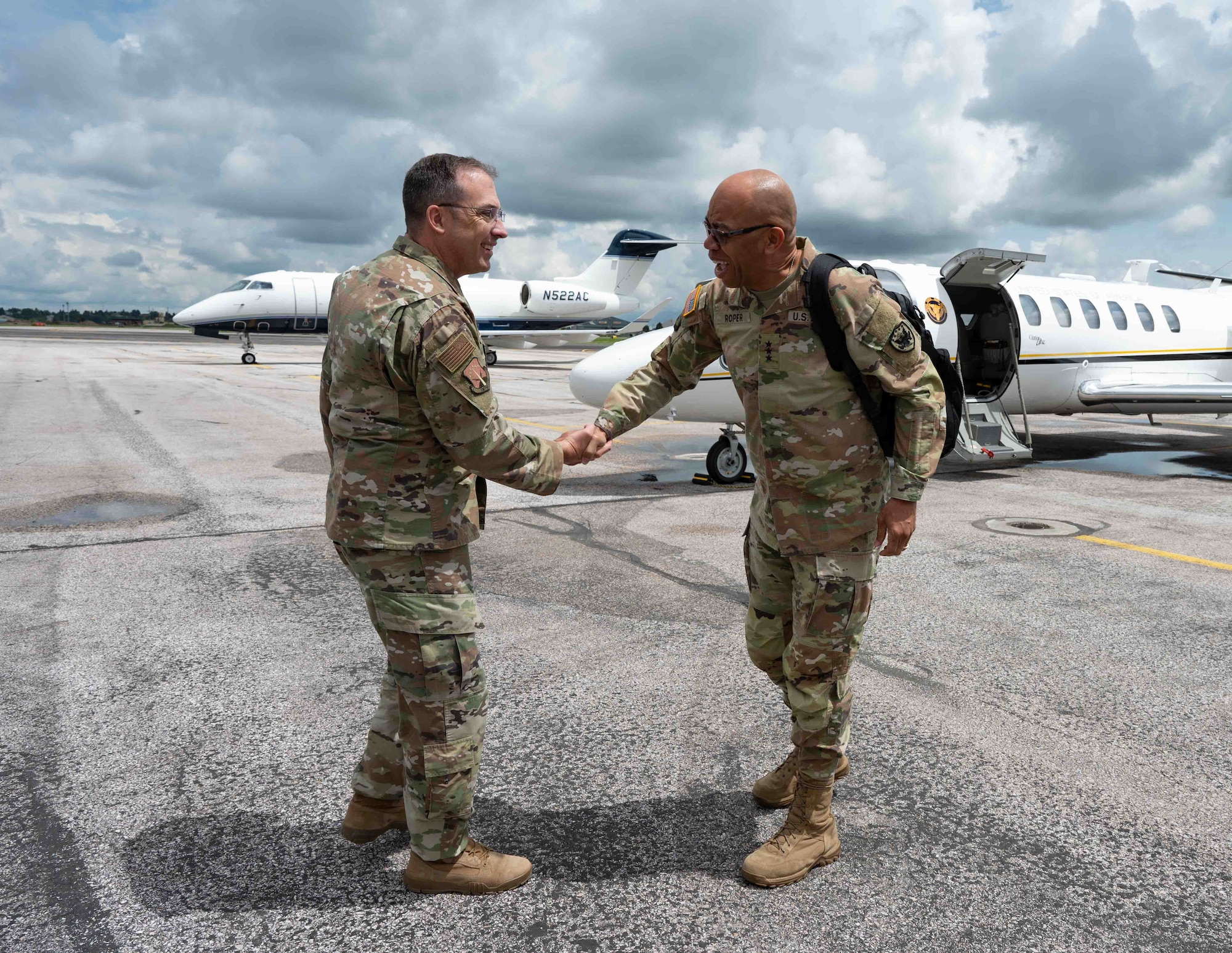 U.S. Army Lt. Gen. A.C. Roper, deputy commander of U.S. Northern Command, is greeted by U.S. Air Force Col. John Hundley, 90th Missile Wing vice commander, at the Cheyenne Regional Airport, Cheyenne, Wyoming, June 13, 2023. Roper visited the 90 MW to see first-hand how the 90 MW mission supports homeland defense. (U.S. Air Force photo by Senior Airman Sarah Post)