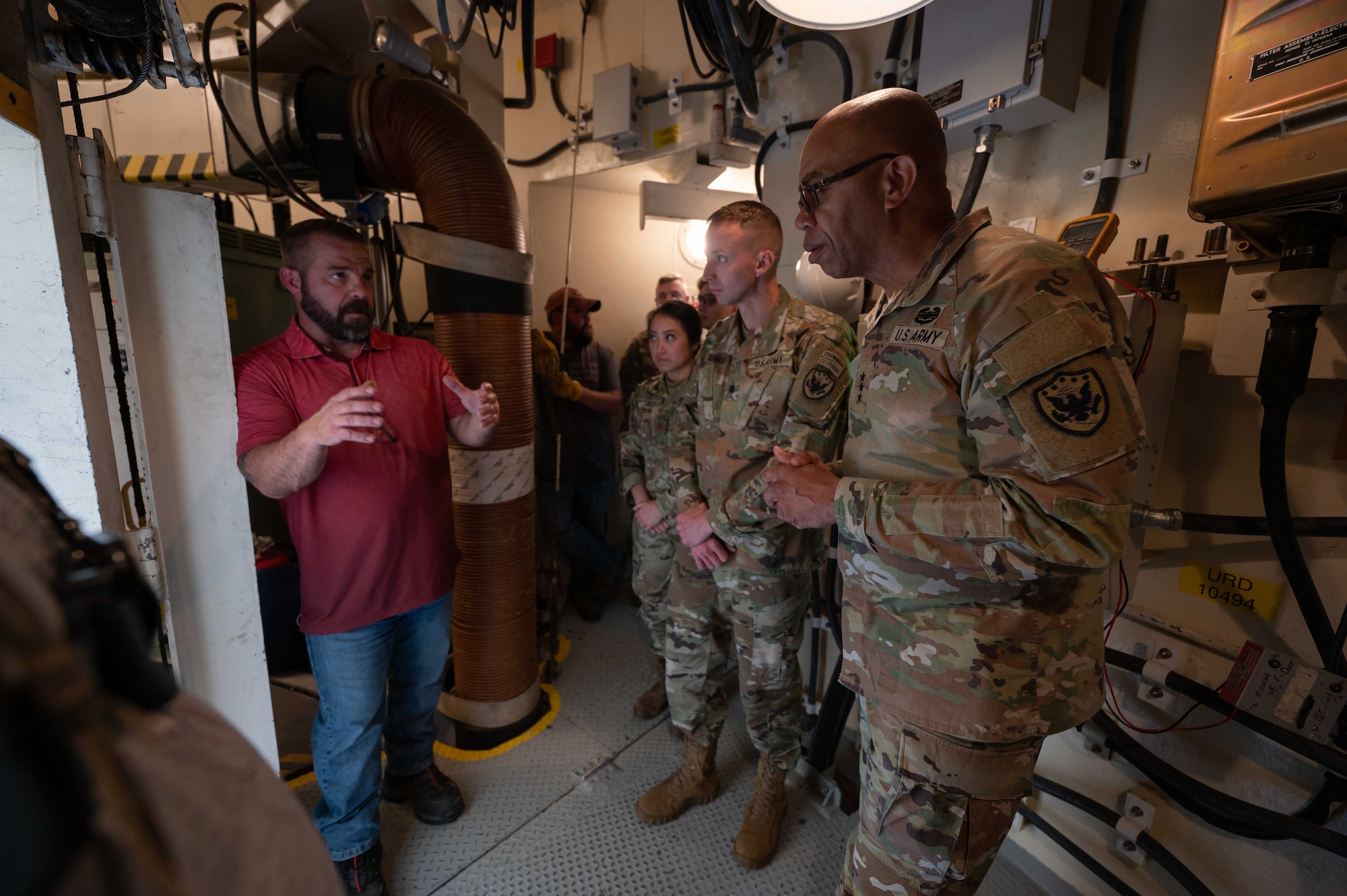 Jeff Erickson, 583rd Missile Maintenance Squadron production superintendent, gives U.S. Army Lt. Gen. A.C. Roper, deputy commander of U.S. Northern Command, a tour of the Bravo-02 launch facility near La Grange, Wyoming, June 13, 2023. Roper came to the 90th Missile Wing to tour a launch facility, missile alert facility, and to see first-hand how an intercontinental ballistic missile mission operates in support of homeland defense. (U.S. Air Force photo by Senior Airman Sarah Post)