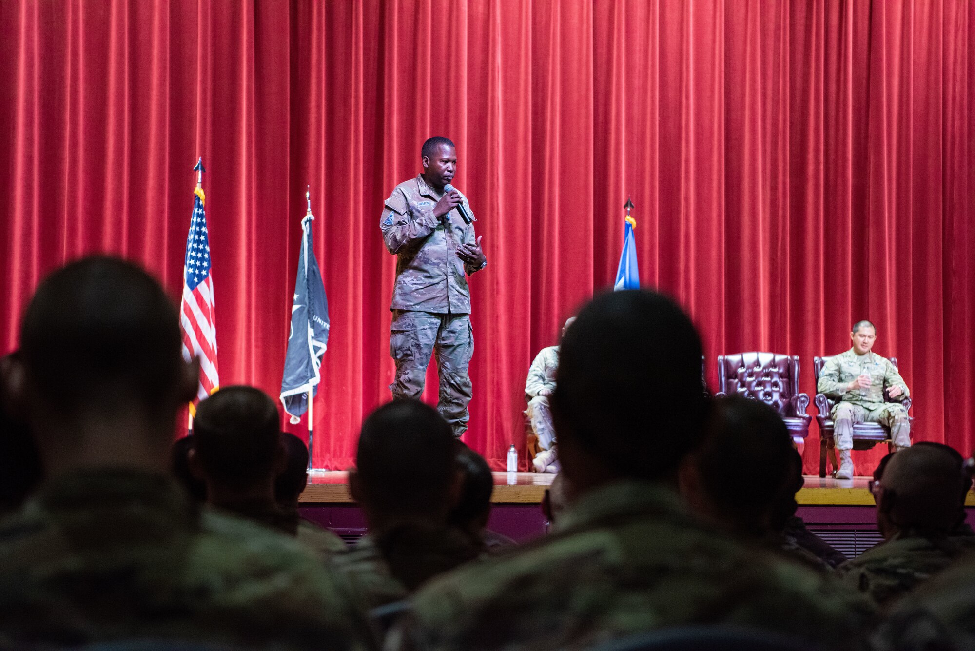Chief Master Sgt. Jacob Simmons, Space Operations Command senior enlisted leader, addresses a room of graduates at the U.S. Space Force patching ceremony at basic military training June 20, 2023.
