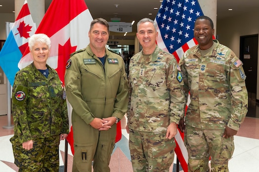  Royal Canadian Air Force Brig Gen G. Michael Adamson, Commander of 3 Canadian Space Division, and CWO Debbie Martens, Chief Warrant Officer of 3 CSD, welcome Lt Gen Stephen Whiting, Space Operations Command commander, and Chief Master Sgt. Jacob Simmons, SpOC Senior Enlisted Leader, to attend meetings at the Canadian National Defence Headquarters, Ottawa, Ont. June 26, 2023. Space is a team sport and our allies and partners are an asymmetrical advantage that our competitors cannot match. (Courtesy photo)