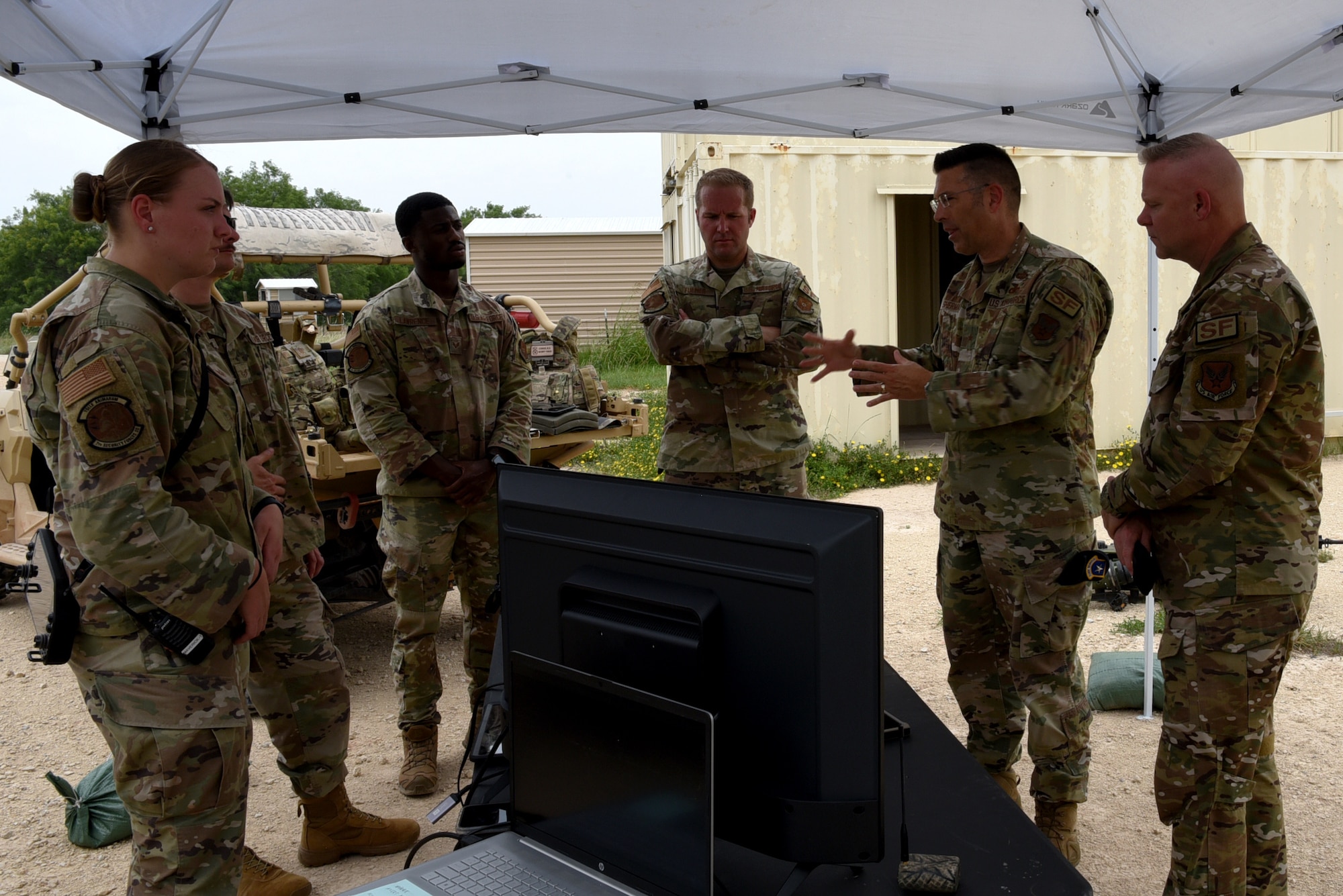 U.S. Air Force Brig. Gen. Thomas Sherman, Security Forces director, speaks to 7th Security Forces Squadron Airmen after a tech demonstration at Dyess Air Force Base, Texas, June 15, 2023. Sherman visited Dyess to present the 7th SFS with the Air Force Best Medium Sized Security Forces Squadron Award along with seeing new innovations including the robotic dog, a new GPS system, upgraded flack vests and more. (U.S. Air Force photo by Senior Airman Sophia Robello)