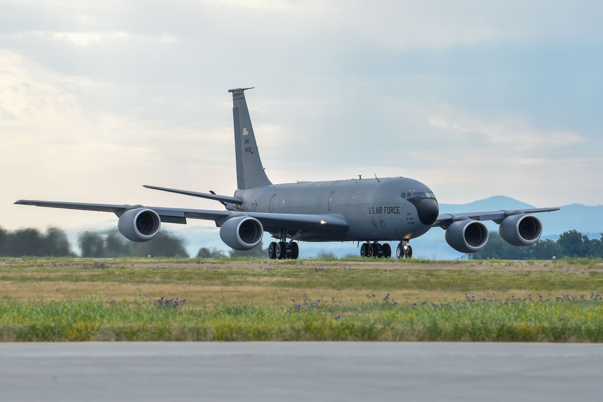 A KC-135 Stratotanker assigned to the 92nd Air Refueling Wing and 141st Air Refueling Wing taxis into position before takeoff as part of Operation Centennial Contact at Fairchild Air force Base, Washington, June 27, 2023. The movement, which included stops at Yellowstone National Park, Mount Rushmore and Glacier National Park, was part of Air Mobility Command’s celebration of 100 years air refueling operations and demonstrated the 92nd Air Refueling Wing’s global reach capabilities. Since its inception in 1923, Air refueling has become a crucial component of military and civilian aviation operations around the world by extending the range and endurance of aircraft and enabling them to complete missions that would otherwise be impossible or require multiple stops. As a result, this capability is essential for strategic and tactical operations, as well as humanitarian relief efforts in support of AMC, U.S. Transportation Command and Department of Defense priorities. (U.S. Air Force photo by Airman 1st Class Lillian Patterson)