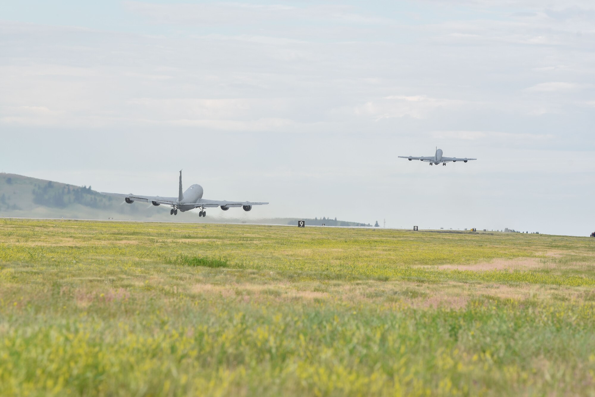 KC-135 Stratotankers assigned to the 92nd Air Refueling Wing and 141st Air Refueling Wing conduct minimum-interval takeoffs as part of Operation Centennial Contact at Fairchild Air force Base, Washington, June 27, 2023. The movement, which included stops at Yellowstone National Park, Mount Rushmore and Glacier National Park, was part of Air Mobility Command’s celebration of 100 years air refueling operations and demonstrated the 92nd Air Refueling Wing’s global reach capabilities. Since its inception in 1923, Air refueling has become a crucial component of military and civilian aviation operations around the world by extending the range and endurance of aircraft and enabling them to complete missions that would otherwise be impossible or require multiple stops. As a result, this capability is essential for strategic and tactical operations, as well as humanitarian relief efforts in support of AMC, U.S. Transportation Command and Department of Defense priorities. (U.S. Air Force photo by Airman 1st Class Lillian Patterson)