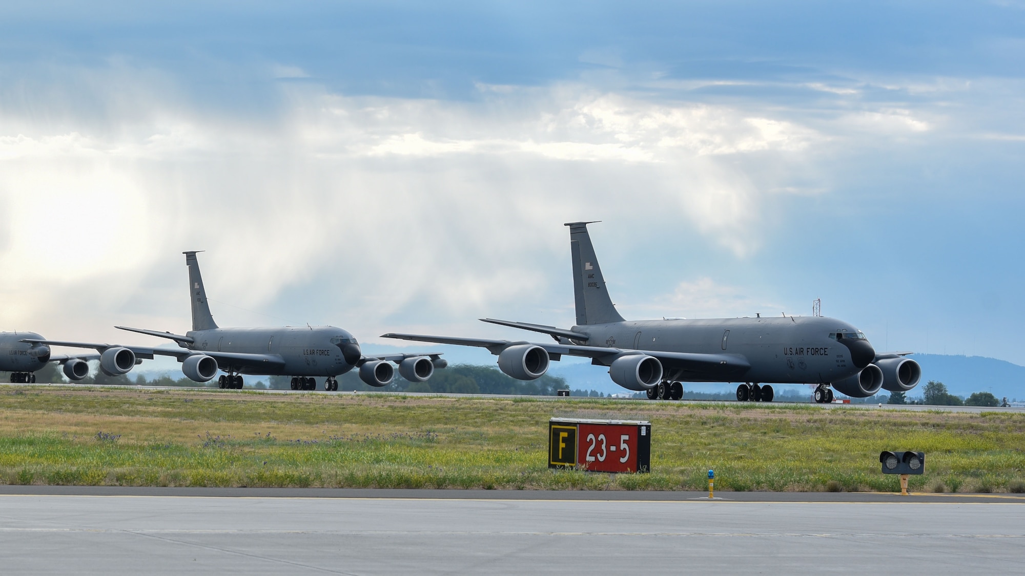 KC-135 Stratotankers assigned to the 92nd Air Refueling Wing and 141st Air Refueling Wing taxi into position before takeoff as part of Operation Centennial Contact at Fairchild Air force Base, Washington, June 27, 2023. The movement, which included stops at Yellowstone National Park, Mount Rushmore and Glacier National Park, was part of Air Mobility Command’s celebration of 100 years air refueling operations and demonstrated the 92nd Air Refueling Wing’s global reach capabilities. Since its inception in 1923, Air refueling has become a crucial component of military and civilian aviation operations around the world by extending the range and endurance of aircraft and enabling them to complete missions that would otherwise be impossible or require multiple stops. As a result, this capability is essential for strategic and tactical operations, as well as humanitarian relief efforts in support of AMC, U.S. Transportation Command and Department of Defense priorities. (U.S. Air Force photo by Airman 1st Class Lillian Patterson)