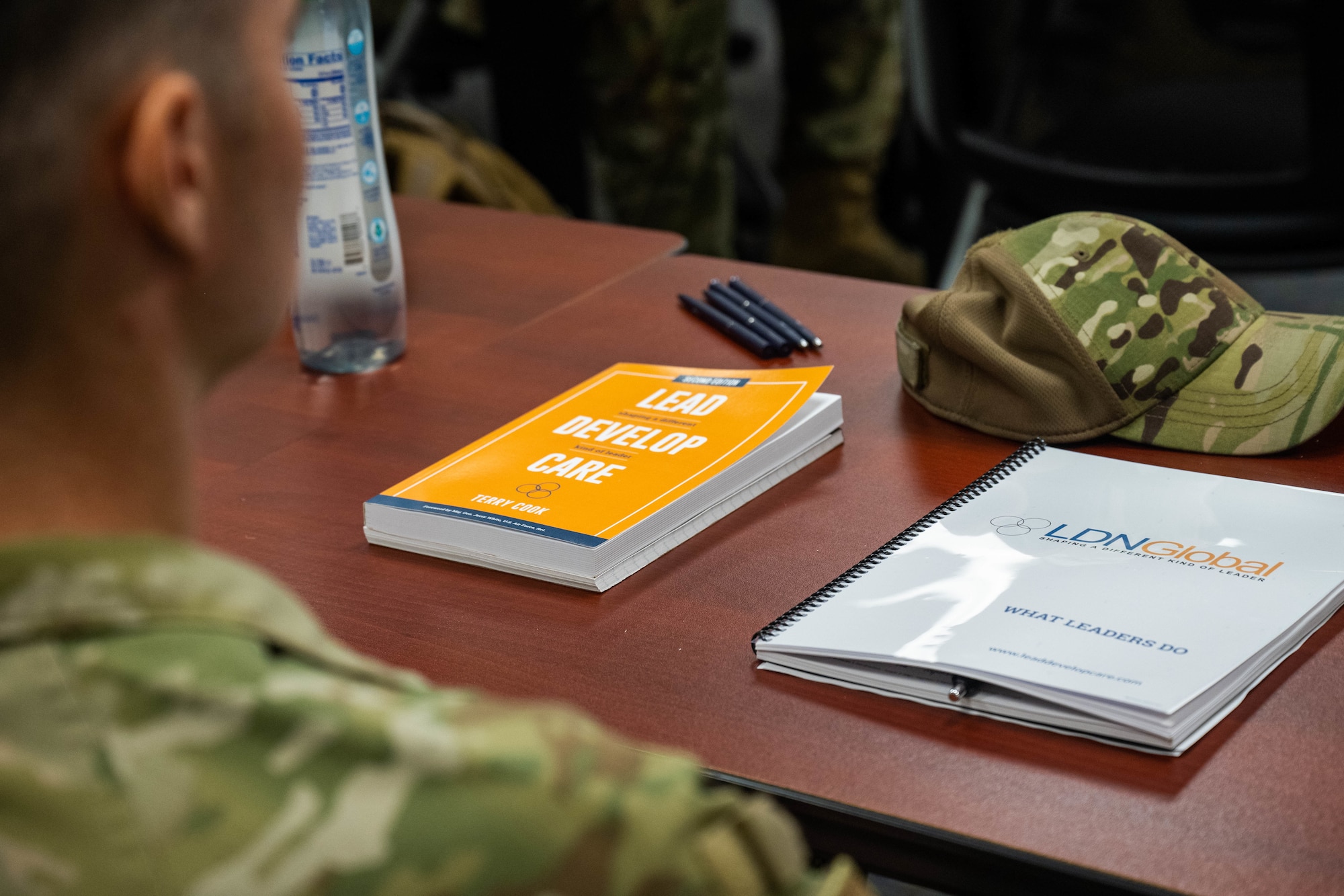 An airmen assigned to Joint Base Pearl Harbor-Hickam attends a leadership development course at Joint Base Pearl Harbor-Hickam, Hawaii, June 21, 2023. This training was designed to showcase leadership through the lead, develop and care model focusing on the areas of leader development, strategy and innovation. (U.S. Air Force photo by Senior Airman Makensie Cooper)