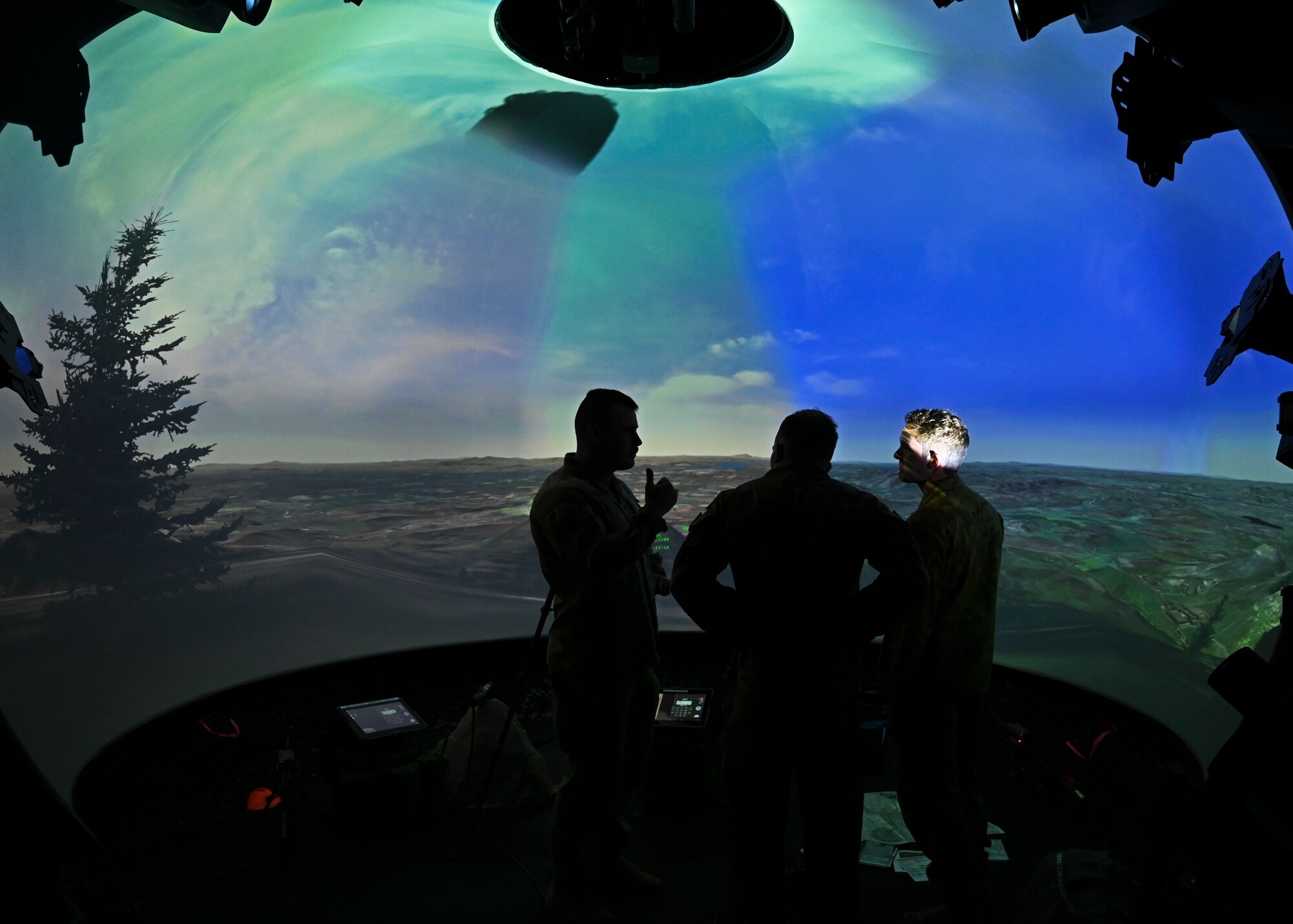 Australian Army joint terminal attack controllers with the 8th/12th Regiment, Royal Australian Artillery, train in a flight simulator with the 5th Air Support Operations Squadron at Joint Base Lewis-McChord, Washington, June 8, 2023. Members of the Australian Army spent the week visiting the 5th ASOS training in the simulator to maintain currency in calling for close air support. (U.S. Air Force Senior Airman Callie Norton)