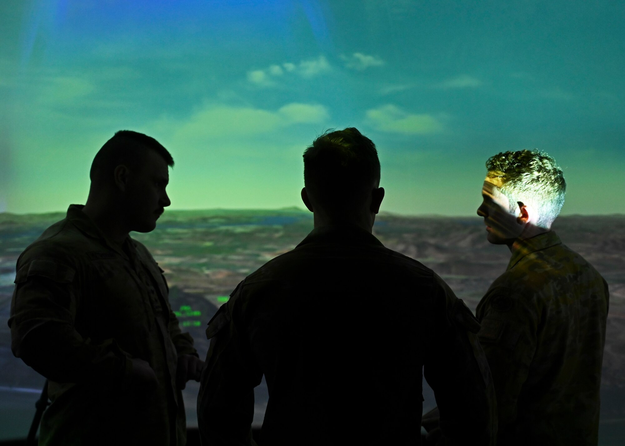 Australian Army joint terminal attack controllers with the 8th/12th Regiment, Royal Australian Artillery, train in a flight simulator with the 5th Air Support Operations Squadron at Joint Base Lewis-McChord, Washington, June 8, 2023. Members of the Australian Army spent the week visiting the 5th ASOS training in the simulator to maintain currency in calling for close air support. (U.S. Air Force Senior Airman Callie Norton)