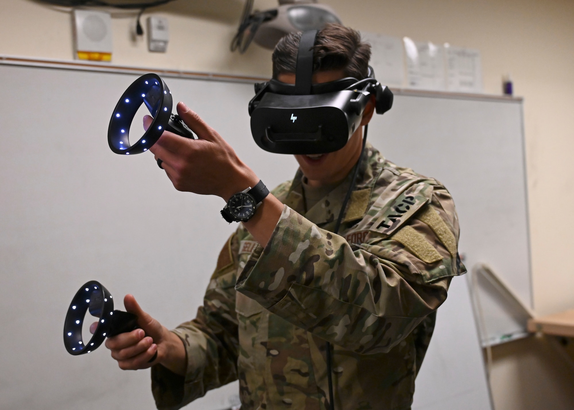 U.S. Air Force Airman 1st Class Lukas Sellers, cyber transport technician with the 627th Communication Squadron, operates a Havik Simulator at Joint Base Lewis-McChord, Washington, June 8, 2023. The 5th Air Support Operation Squadron will use the new portable simulator to practice mission requirements on site, prior to navigating real world missions. (U.S. Air Force Senior Airman Callie Norton)
