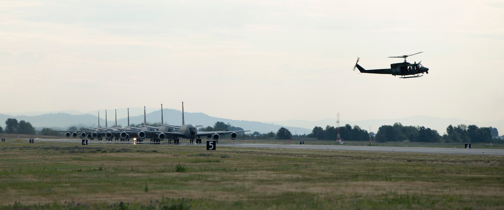 KC-135 Stratotankers assigned to the 92nd Air Refueling Wing and 141st Air Refueling Wing taxi into position before takeoff as part of Operation Centennial Contact at Fairchild Air force Base, Washington, June 27, 2023. The movement, which included stops at Yellowstone National Park, Mount Rushmore and Glacier National Park, was part of Air Mobility Command’s celebration of 100 years air refueling operations and demonstrated the 92nd Air Refueling Wing’s global reach capabilities. Since its inception in 1923, Air refueling has become a crucial component of military and civilian aviation operations around the world by extending the range and endurance of aircraft and enabling them to complete missions that would otherwise be impossible or require multiple stops. As a result, this capability is essential for strategic and tactical operations, as well as humanitarian relief efforts in support of AMC, U.S. Transportation Command and Department of Defense priorities. (U.S. Air Force photo by Tech. Sgt. Michael Brown)