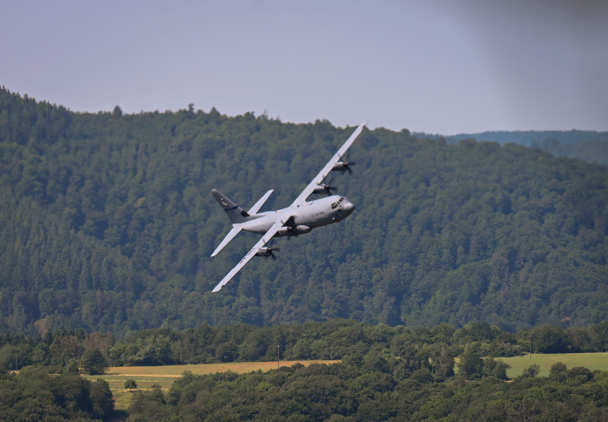 C-130J Flying over German countryside.