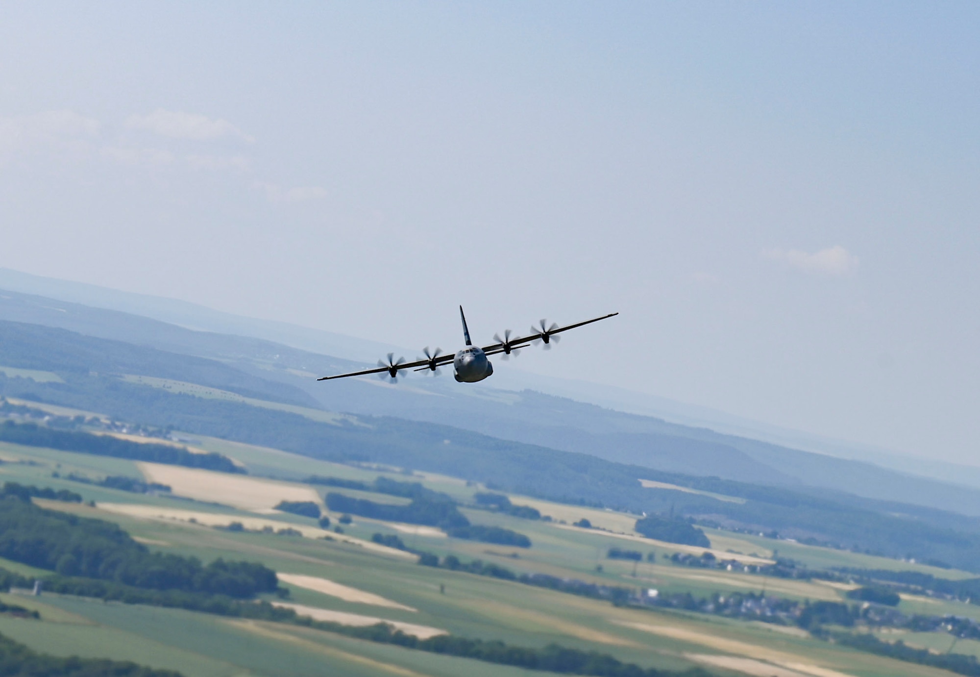 C-130J Flying over German countryside.