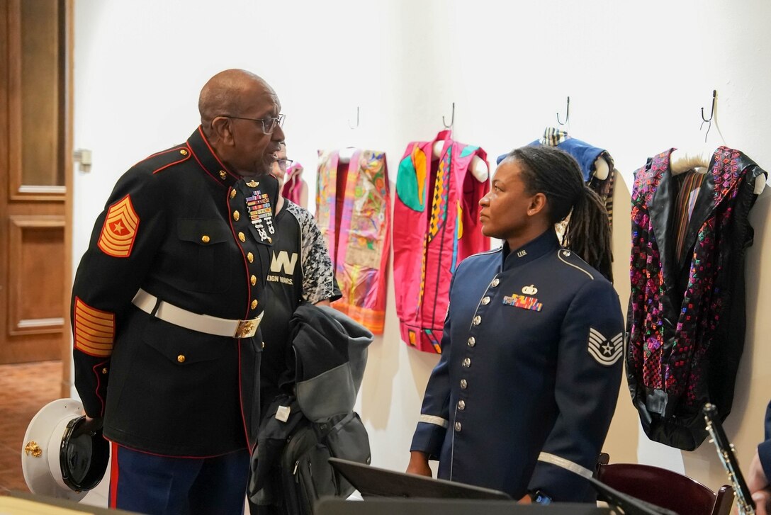 TSgt Howard meets a local veteran at a ceremony in Vallejo