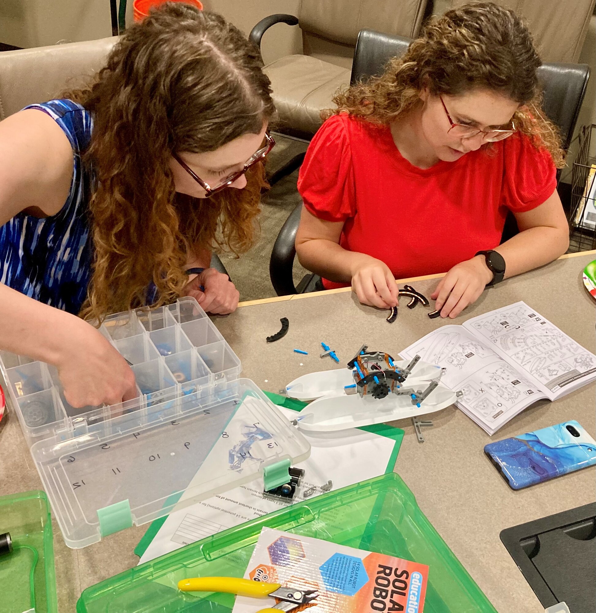 Interns work on a solar robot as part of Foundational Botcamp, an educational course for new employees and interns that is designed primarily to help demonstrate and emphasize the importance of teamwork. (Courtesy photo)