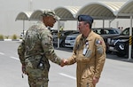 U.S. Air Force Col. Terence G. Taylor, left, 380th Air Expeditionary Wing commander, and Lieutenant-colonel Bruno from the French Air and Space Force meet prior to a mission brief for Pégase 2023 at Al Dhafra Air Base, United Arab Emirates, June 25, 2023. During Pégase 2023, the French Air and Space Force are deploying 19 aircraft and 320 personnel to the Indo-Pacific region until Aug. 3, 2023. While there, French forces are scheduled to participate in multinational, large force exercises led by the U.S. Air Force and held with regional partners. (U.S. Air Force photo by Tech. Sgt. Alex Fox Echols III)