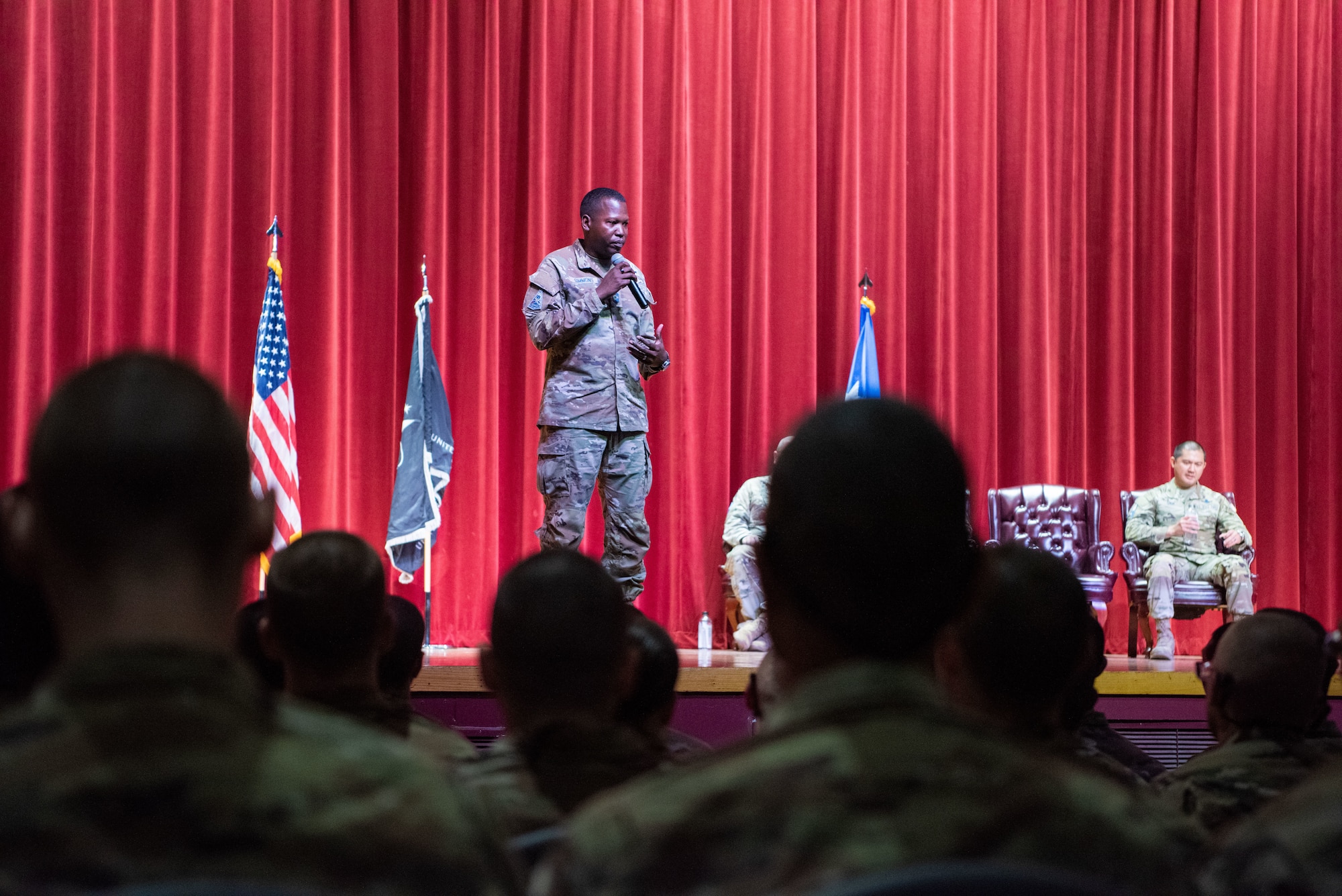 Chief Master Sgt. Jacob Simmons, Space Operations Command senior enlisted leader, addresses a room of graduates at the U.S. Space Force patching ceremony at basic military training June 20, 2023.