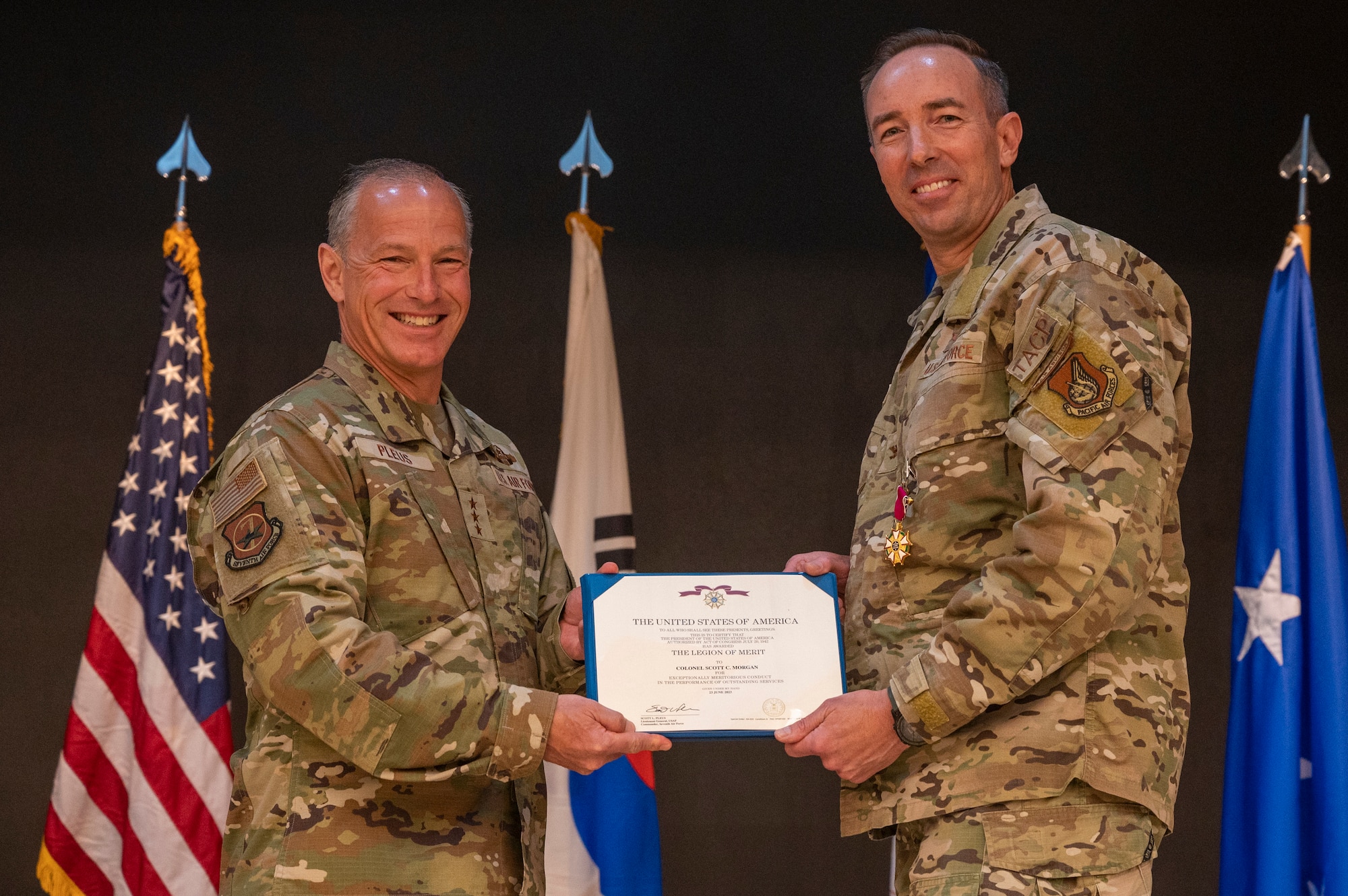 U.S. Air Force Lt. Gen. Scott Pleus, left, 7th Air Force commander, presents a Meritorious Service Medal (MSM) to Col. Scott Morgan, 607th Air Support Operations Group outgoing commander, at Osan Air Base, Republic of Korea, June 26, 2023. The MSM is a military decoration awarded by various branches of the Armed Forces to recognize distinguished or outstanding meritorious service. (U.S. Air Force photo by Senior Airman Aaron Edwards)