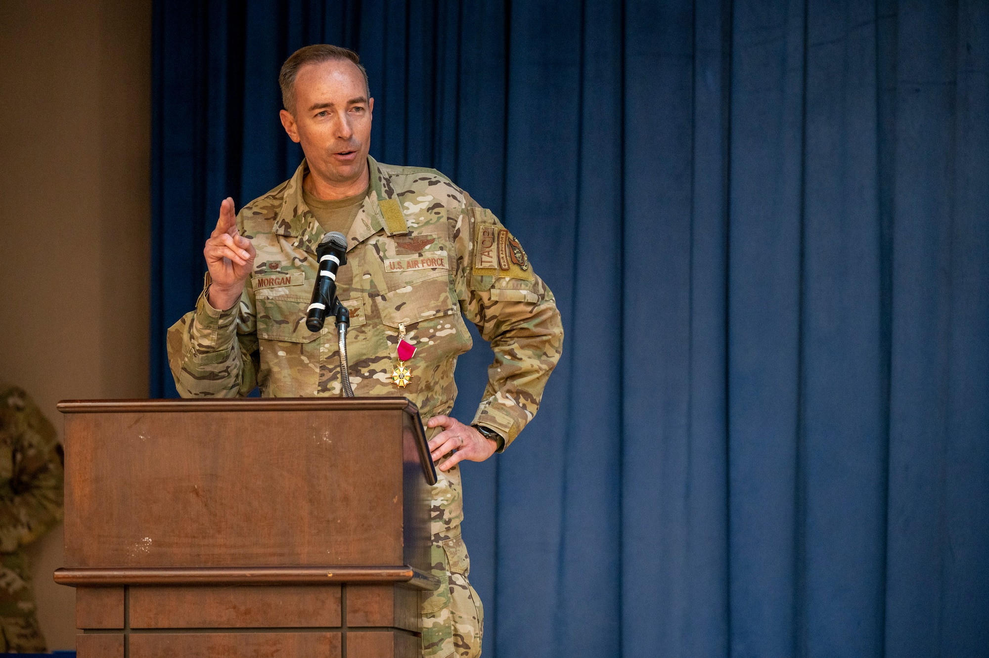 U.S. Air Force Col. Scott Morgan, left, 607th Air Support Operations Group (ASOG) outgoing commander, provides a speech during a change of command at Osan Air Base, Republic of Korea, June 26, 2023. During the ceremony, Col. Patrick Lowe took command of the 607th ASOG. (U.S. Air Force photo by Senior Airman Aaron Edwards)