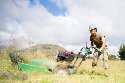 Spc. Alexander Guthrie, a Broken Arrow, Oklahoma resident serving as a carpentry and masonry specialist with the 3120th Engineer Support Company, 120th Engineer Battalion, 90th Troop Command, Oklahoma Army National Guard, clears tall grass during clean up and renovations at the Girl Scouts of Hawaii's Camp Kilohana near Pahokuloa Training Area, Hawaii, June 14, 2023.

The Soldiers of the 3120th ESC are taking part in an Innovative Readiness Training program to improve their skills as Army engineers while providing the Girl Scout camp with improvements. (Oklahoma National Guard photo by Sgt. Anthony Jones)