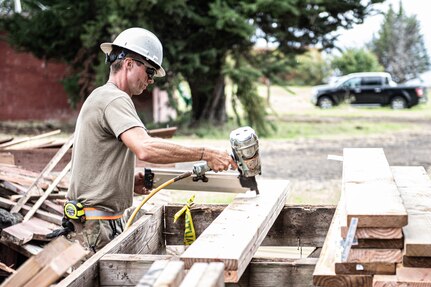 Sgt. Hunter Konemann, a Mustang, Oklahoma resident serving as a carpentry and masonry specialist with the 3120th Engineer Support Company, 120th Engineer Battalion, 90th Troop Command, Oklahoma Army National Guard, builds support beams for a deck at the Girl Scouts of Hawaii's Camp Kilohana near Pahokuloa Training Area, Hawaii, June 14, 2023.

The Soldiers of the 3120th ESC are taking part in an Innovative Readiness Training program to improve their skills as Army engineers while providing the Girl Scout camp with improvements. (Oklahoma National Guard photo by Sgt. Anthony Jones)