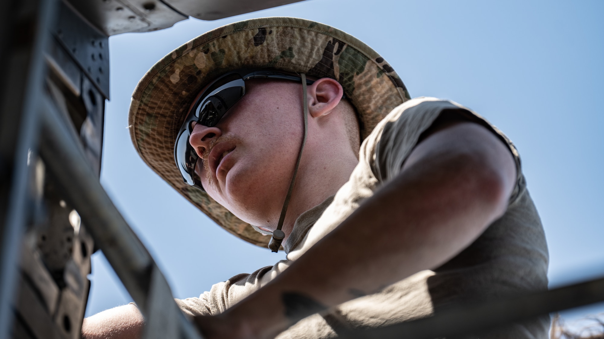 Senior Airman Austin Willard, 386th Expeditionary Aircraft Maintenance Squadron aerospace propulsion technician, prepares a C-130J Super Hercules for an engine swap at Ali Al Salem Air Base, Kuwait, June 27, 2023. The 386th Air Expeditionary Wing is the primary airlift hub and gateway for delivering combat power to joint and coalition forces in the U.S. Central Command area of responsibility. (U.S. Air Force photo by Staff Sgt. Kevin Long)