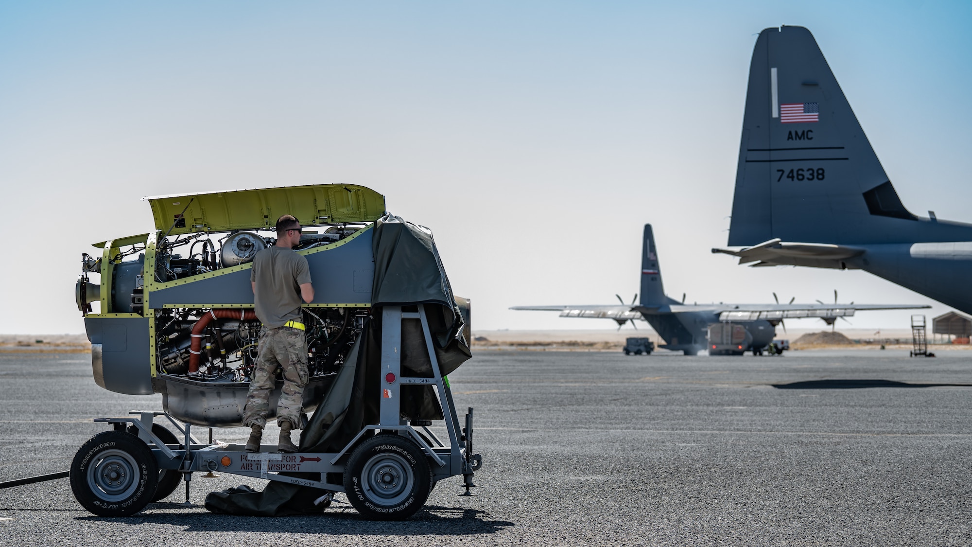 U.S. Air Force Staff Sgt. Jay Michael Rymarz, 386th Expeditionary Aircraft Maintenance Squadron aerospace propulsion technician, inspects an engine before it is installed onto a C-130J Super Hercules at Ali Al Salem Air Base, Kuwait, June 27, 2023. The 386th EAMXS ensures their aircraft are always ready to deliver world-class warfighter support as a key airlift and airdrop enabled asset. (U.S. Air Force photo by Staff Sgt. Kevin Long)