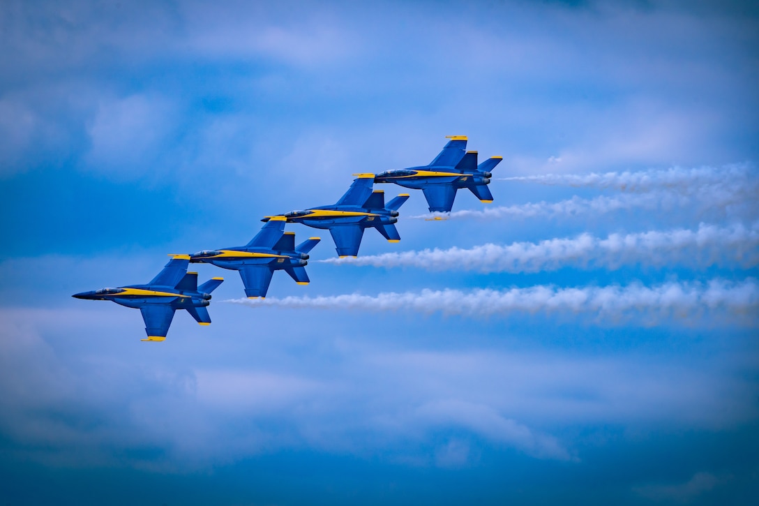 United States Navy Blue Angels perform their aerobatics demonstration during an air show in Dayton, Ohio on July 31, 2022. The Dayton Airshow is an annual event held at the Dayton International Airport for aerobatics demonstrations and static displays of aircraft. (U.S. Marine Corps photo by Sgt. Leo Amaro)