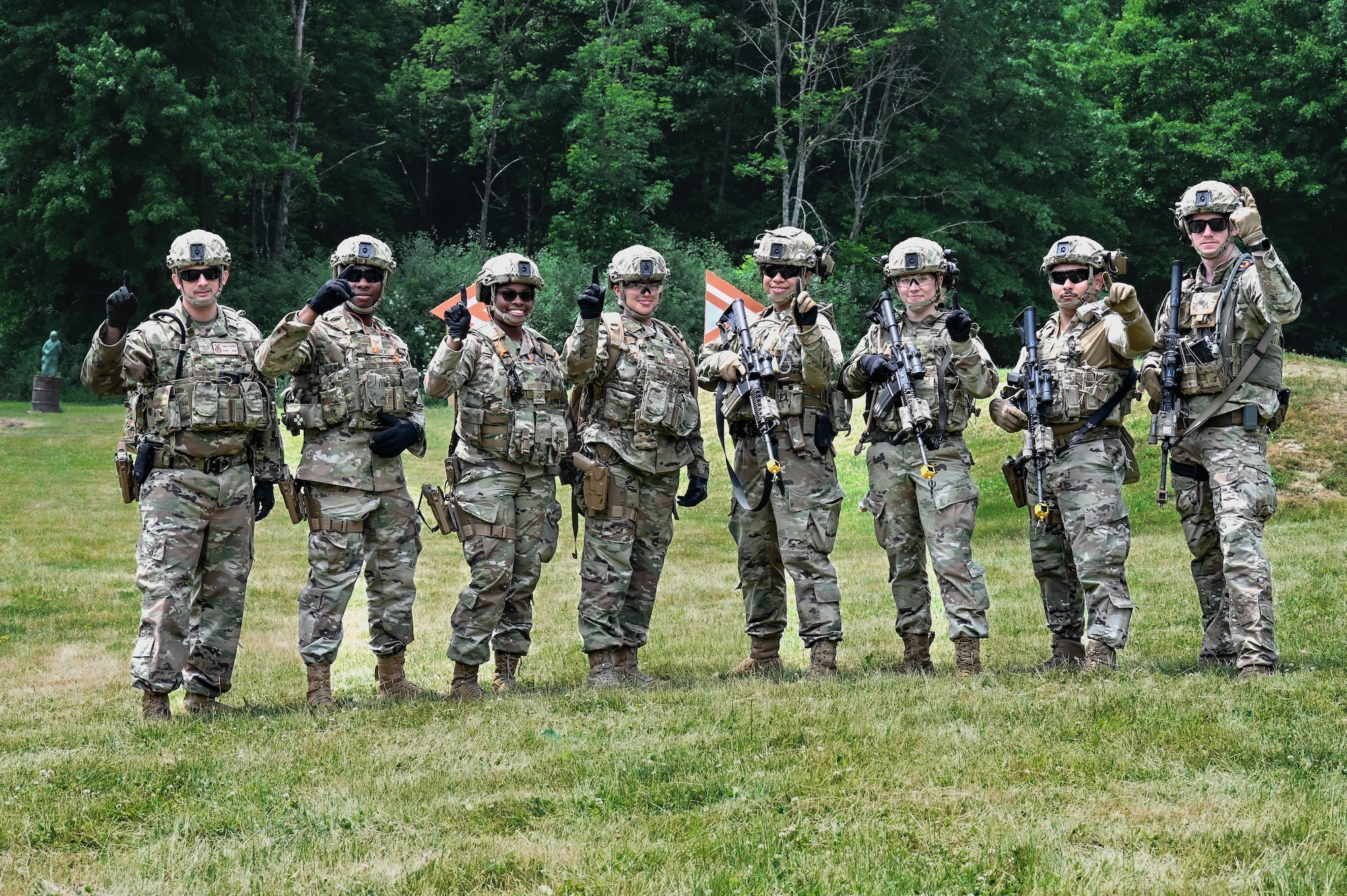 Defenders assigned to the 301st Security Forces Squadron, Carswell Field, Naval Air Station Joint Reserve Base Fort Worth, Texas, pose for a photo on June 8, 2023, at Camp James A. Garfield Joint Military Training Center, Ohio.
