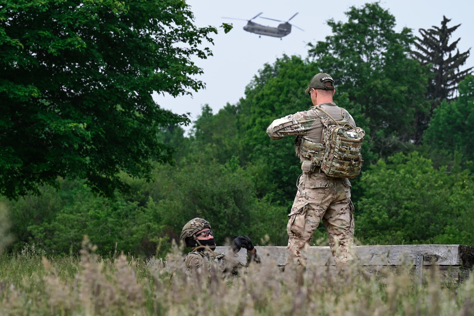 Tech. Sgt. Anthony McDaniel, an Integrated Defense Leadership Course cadre member assigned to the 914th Security Forces Squadron, Niagara Falls Air Reserve Station, New York, gives detonation instructions to a student on June 8, 2023, at Camp James A. Garfield Joint Military Training Center, Ohio.