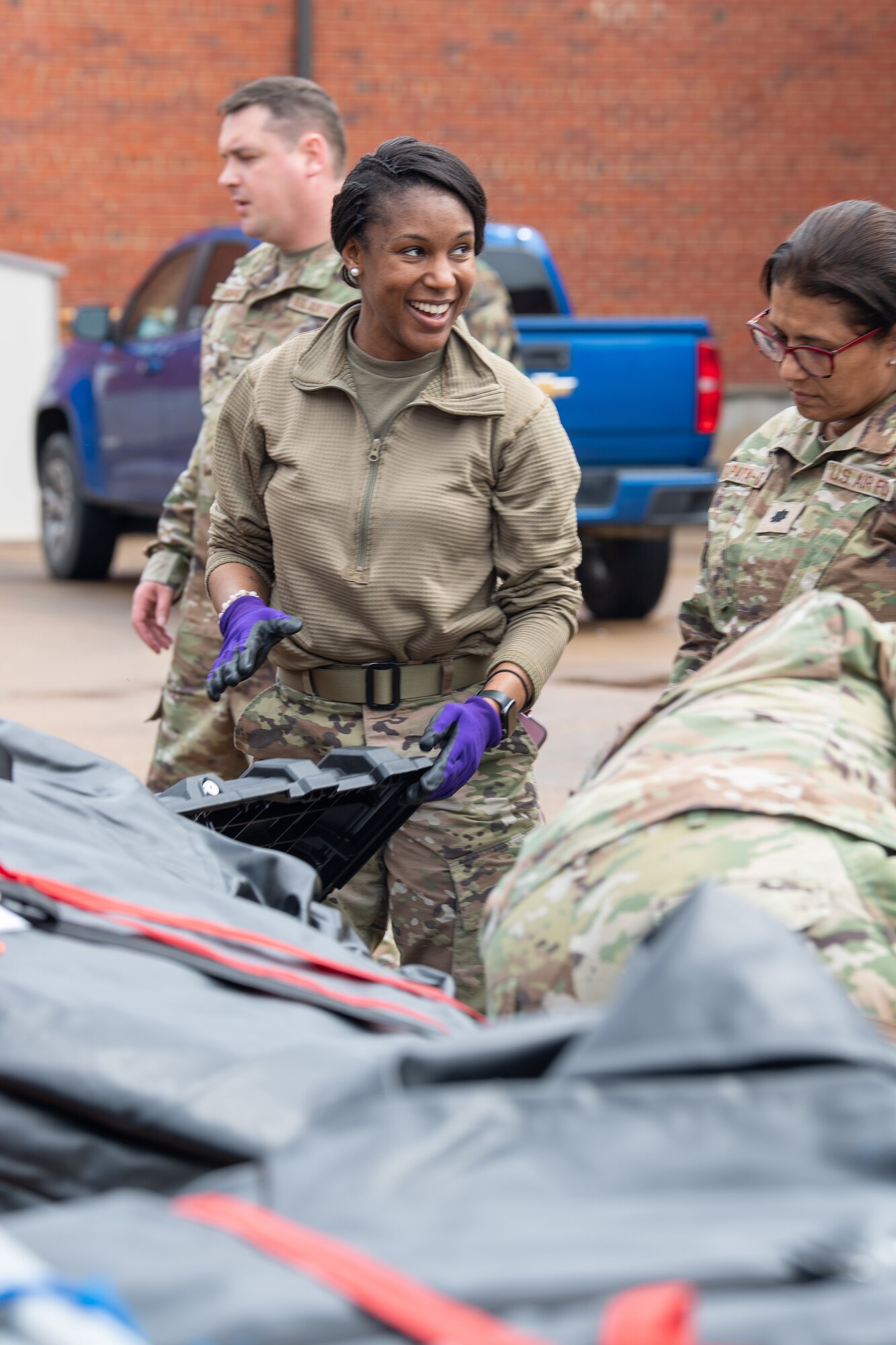 Airman opening pelican case