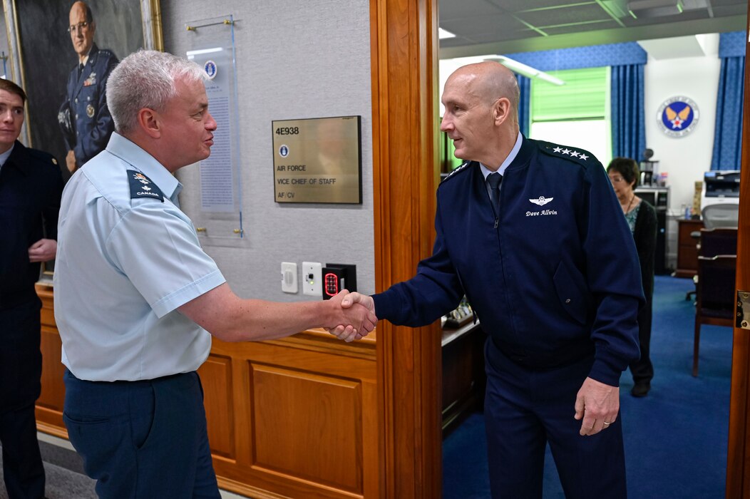 Vice Chief of Staff of the Air Force Gen. David Allvin greets Royal Canadian Air Force Deputy Commander Maj. Gen. Colin Keiver during the first iteration of the Bilateral American Canadian Optimization Network, or BACON, at the Pentagon, June 21, 2023. The meeting renewed connections between the two air forces and set a trajectory for combined efforts on concepts and capability modernization. (U.S. Air Force photo by Eric Dietrich)