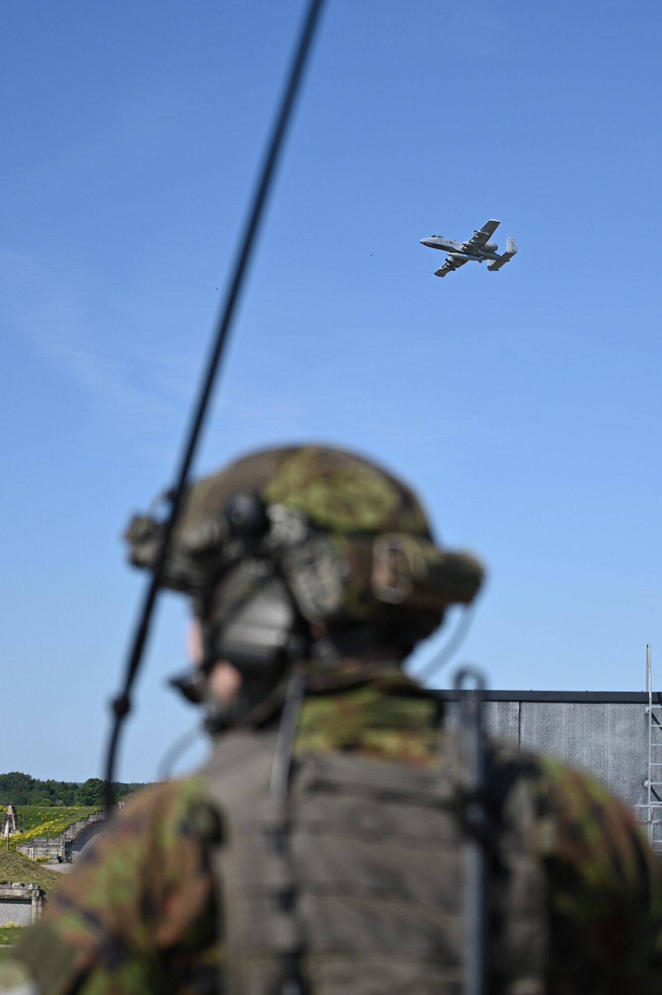 Estonian joint terminal attack controllers request close air support from U.S. Air Force A-10C Thunderbolt II aircraft assigned to the 104th Fighter Squadron, 175th Wing, Maryland National Guard, during a training sortie June 14, 2023, at Tapa Army Base, Estonia.