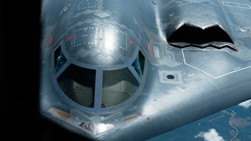 Aircraft refuels in flight.
