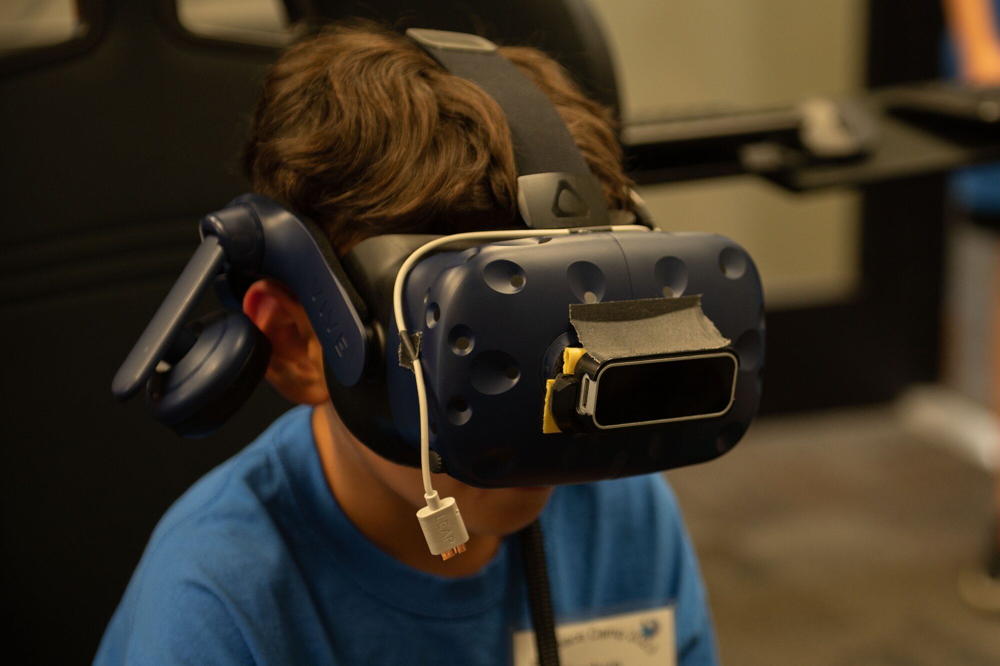 A Wayne County student uses the 4th Training Squadrons flight simulator during an Aerospace Camp community event at Seymour Johnson Air Force Base, North Carolina, June 22, 2023. The Aerospace Camp gave students an opportunity to meet Airmen who use science, technology, engineering and math (STEM) when performing their mission, and tour locations on base to learn how Team Seymour contributes to the Air Combat Command and U.S. Air Force mission. (U.S. Air Force photo by Airman 1st Class Rebecca Sirimarco-Lang)