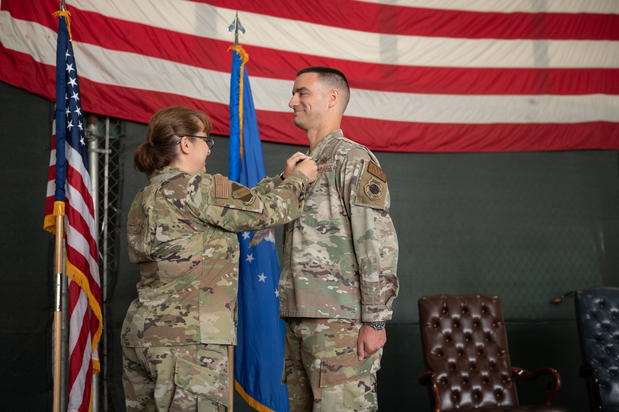 U.S. Air Force Col. Kathryn Roman, left, 4th Maintenance Group commander, pins the Meritorious Service Medal on U.S. Air Force Maj. Michael Makaryk, right, 335th Fighter Generation Squadron commander, during a change of command ceremony at Seymour Johnson Air Force Base, North Carolina, June 23, 2023. The Meritorious Service Medal is a military award presented to members of the United States Armed Forces who distinguished themselves by outstanding service. (U.S. Air Force photo by Airman 1st Class Rebecca Sirimarco-Lang)