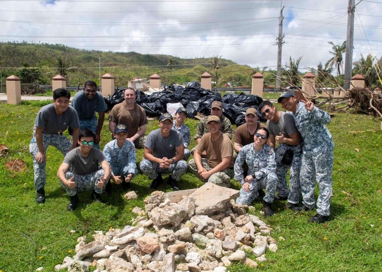 U.S. AND REPUBLIC OF SINGAPORE SAILORS AND AIRMEN PARTICIPATE IN BEACH CLEANUP