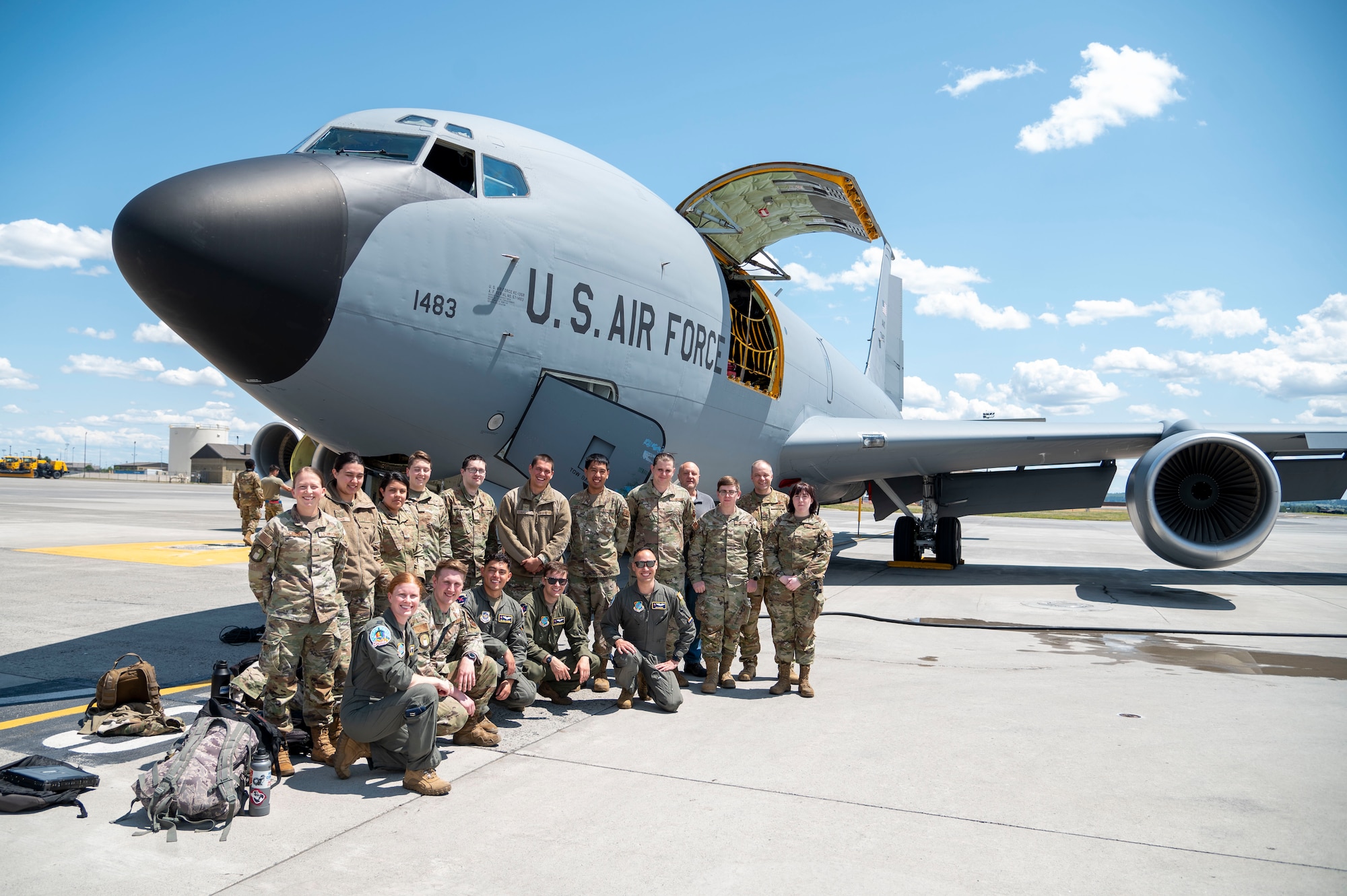 U.S. Airmen pose in front of a KC-135 Stratotanker following a Pride flight at Fairchild Air Force Base, Washington, June 22, 2023. Airmen participated in a Pride flight that honors the diverse backgrounds and strengths that the lesbian, gay, bisexual, trans, queer, plus Airmen bring to the Fairchild mission. (U.S. Air Force photo by Airman 1st Class Lillian Patterson)