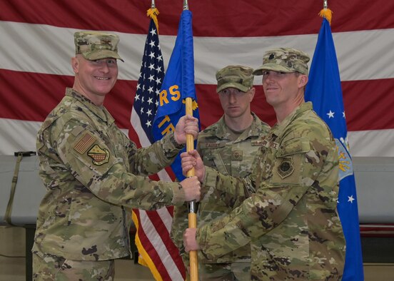 U.S. Air Force Col. Charles Ploetz, 82nd Training Group commander, passes the 532nd Training Squadron flag to U.S. Air Force Lt. Col. Frank Scopa, incoming 532nd Training Squadron commander, during a change of command ceremony at the squadron’s hanger on Vandenberg Space Force Base, Calif., June 9, 2023. Scopa will take U.S. Air Force Lt. Col. Christiam Ormaza’s place as the 532nd Training Squadron commander. (U.S. Space Force photo by Senior Airman Rocio Romo)