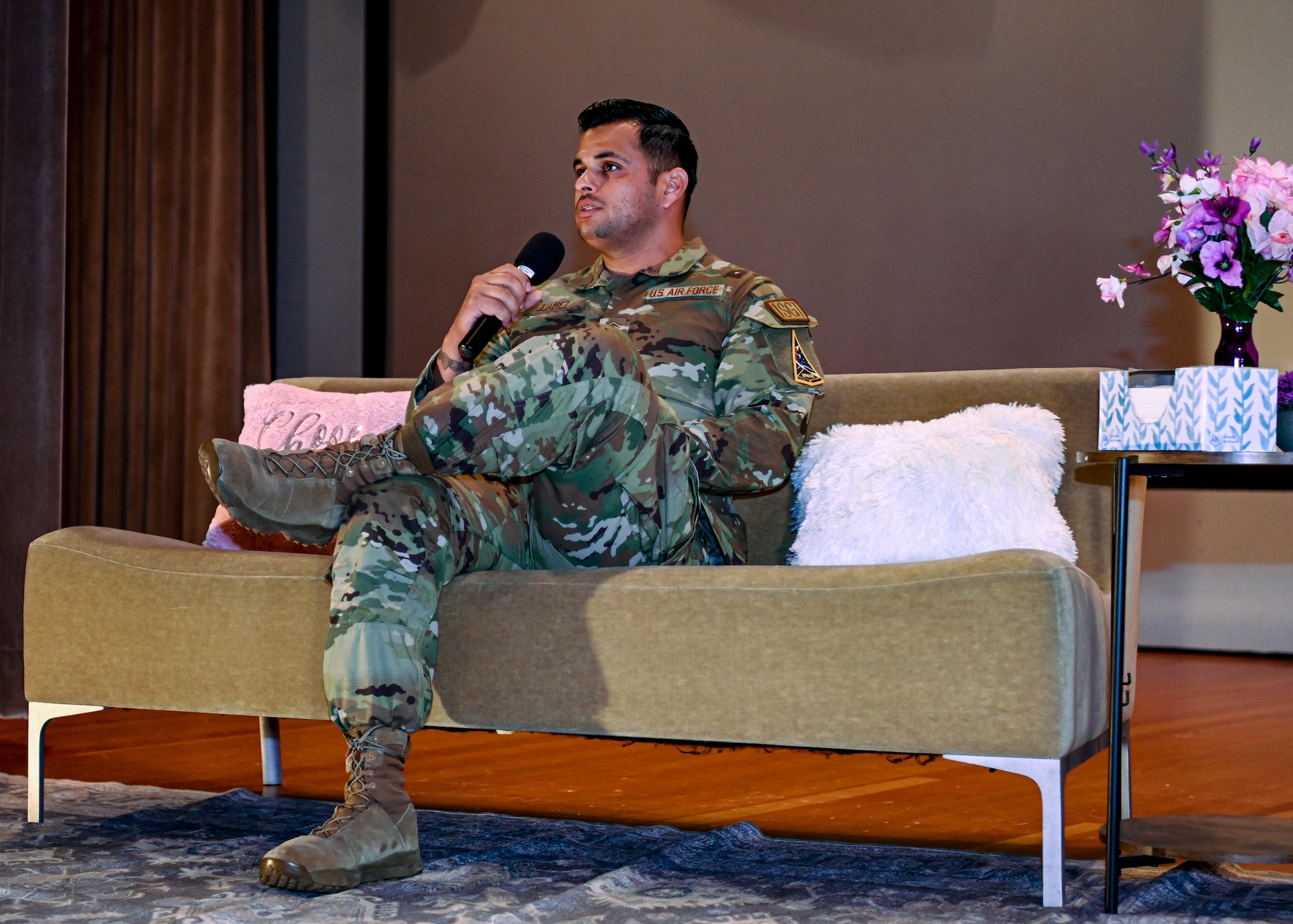 U.S. Air Force Master Sgt. Octavio Juarez, 30th Logistics Readiness Squadron first sergeant, shares his story of resiliency and triumph during an event hosted at the theater on Vandenberg Space Force Base, Calif., June 27, 2023. Five Air Force members presented their powerful narratives in front of a live audience to inspire unity, promote mental health awareness, and foster a culture of support within the military community. The event was sponsored by the Women of Vandenberg Empowerment Network and the chapel. (U.S. Space Force Photo by Senior Airman Tiarra Sibley)