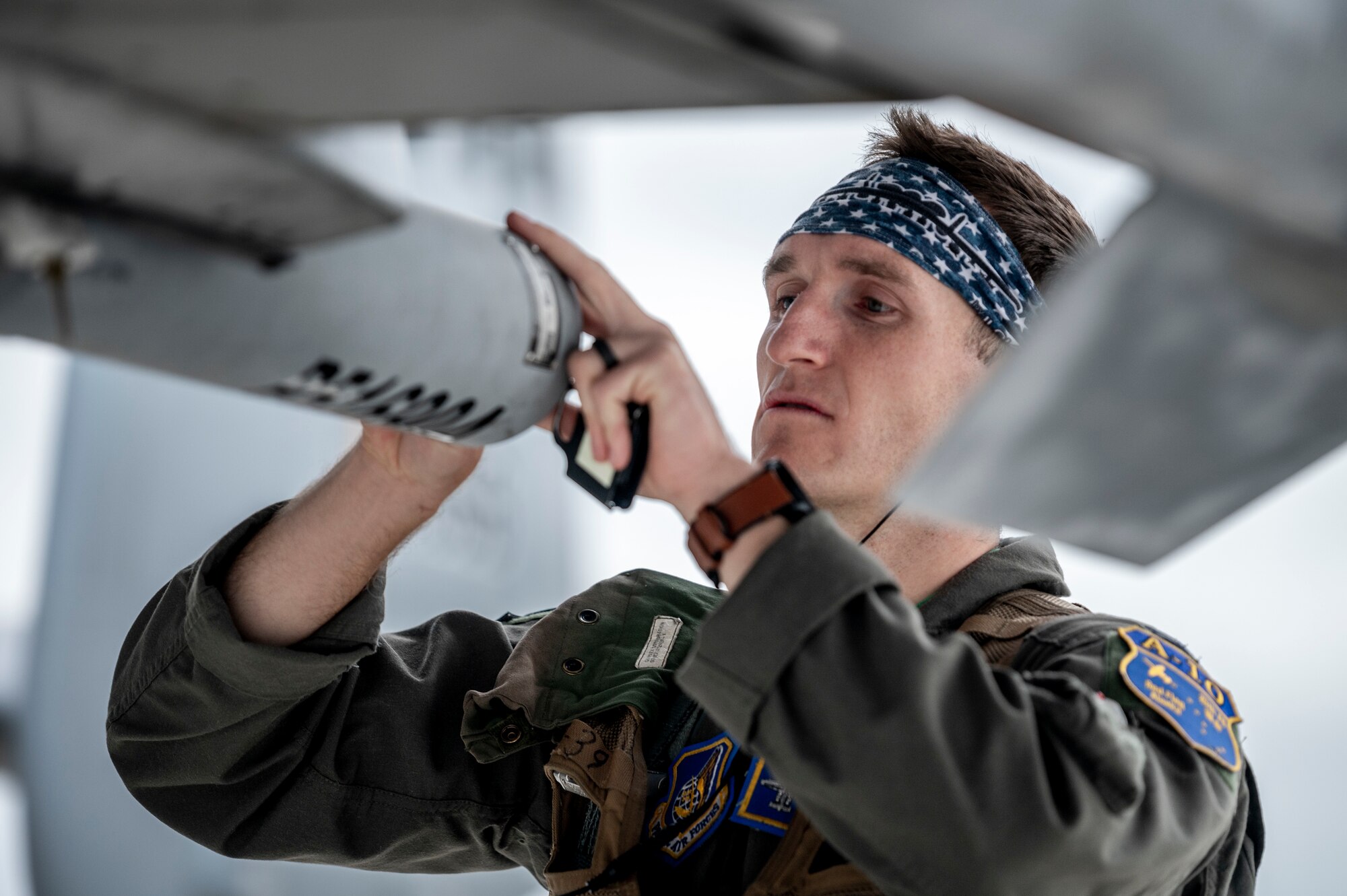 U.S. Air Force Capt. Zachary Kocur, 25th Fighter Squadron pilot, performs pre-flight checks on an A-10C Thunderbolt II during the first day of Red Flag Alaska 23-2 at Eielson Air Force Base, Alaska, June 9, 2023.