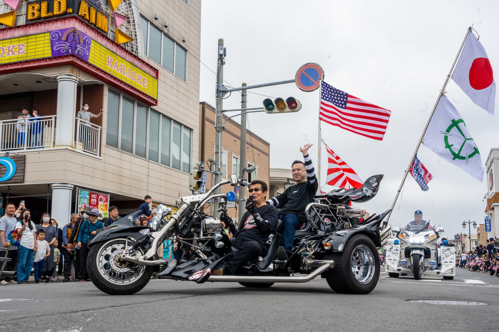 Participants of the American Day parade drive past the crowds in Misawa City, Japan, June 25, 2023. American Day is one of the largest cross-cultural festivals in the area and it made a return after being on hiatus due to COVID-19. The event, drawing over 50,000 visitors, took on the theme “two cultures, but one community.” (U.S. Air Force photo by Staff Sgt. Kristen Heller)