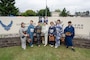 Japanese attendees dressed in yukatas pose for a photo in front of the Misawa Air Base signs in Misawa City, Japan, June 25, 2023. American Day is one of the largest cross-cultural festivals in the area and it made a return after being on hiatus due to COVID-19. The event, drawing over 50,000 visitors, took on the theme “two cultures, but one community.” (U.S. Air Force photo by Staff Sgt. Kristen Heller)