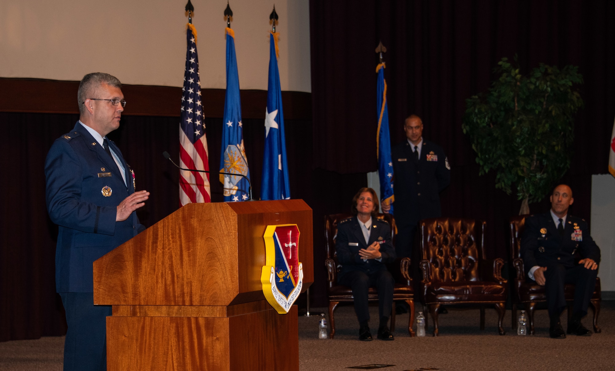 Col. Anthony D. Babcock gives his final remarks as commander before relinquishing command of the Thomas N. Barnes Center for Enlisted Education to Col. Damian Schlussel during a change of command ceremony at the Senior Noncommissioned Officer Academy on Maxwell Air Force Base - Gunter Annex, June 28, 2023. (U.S. Air Force photo/Brian Ferguson)