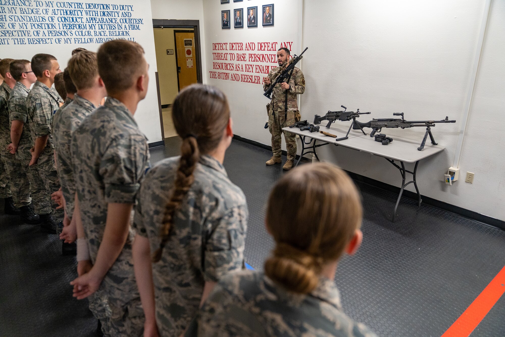U.S. Air Force Senior Airman Armand Lopez, 81st Security Forces Squadron armorer, briefs cadets during the Louisiana Civil Air Patrol Encampment at Keesler Air Force Base, Mississippi, June 23, 2023.