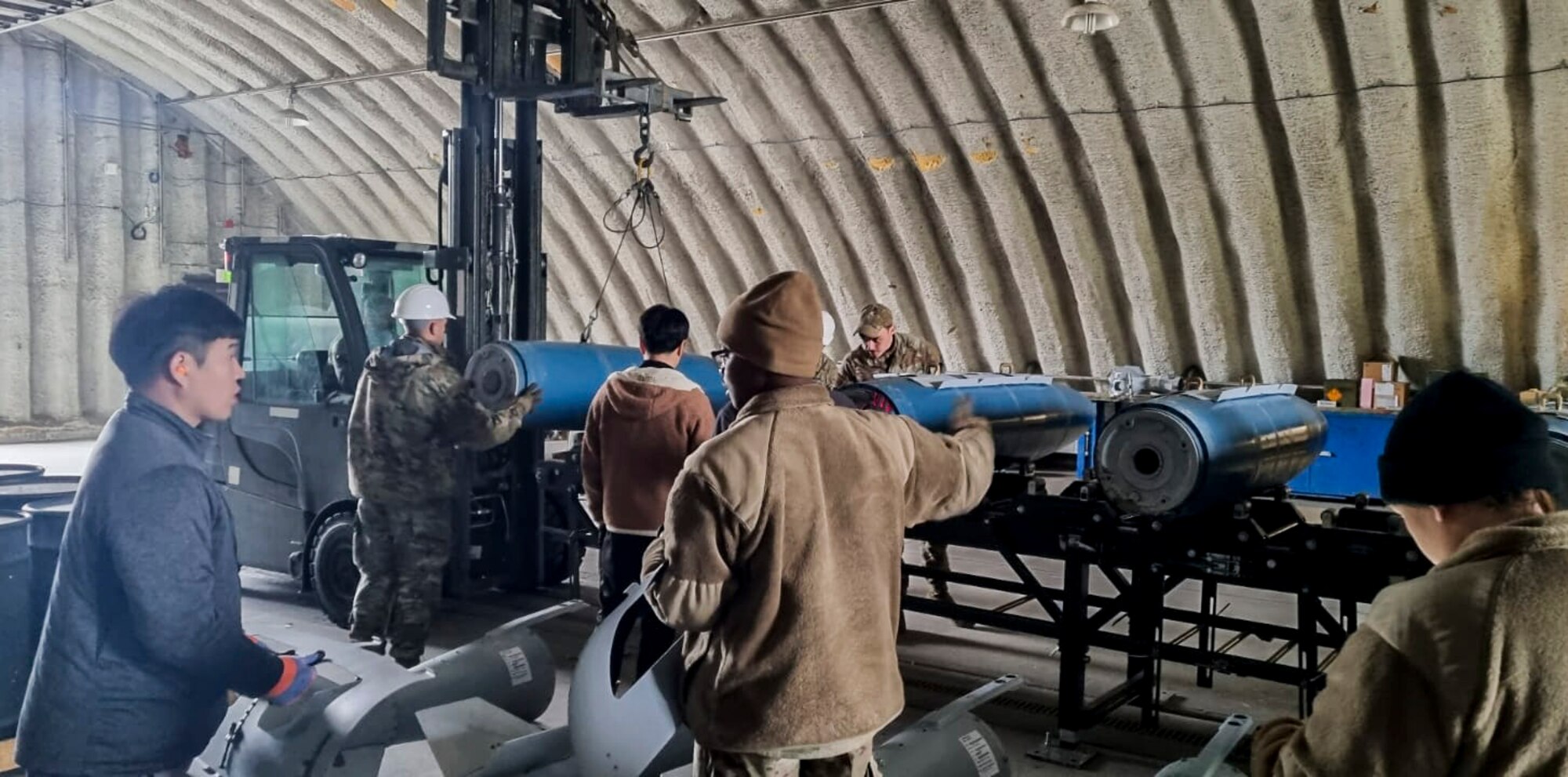 Members of the 51st Munitions Squadron build GBU-31V1 training munitions in support of Red Flag Alaska (RF-A) 23-2 at Eielson Air Force Base, Alaska, June 12, 2023.