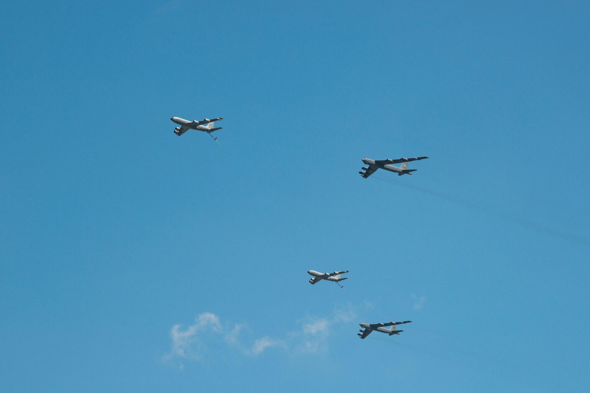 A formation of two B-52 H Stratofortresses, assigned to the 5th Bomb Wing, and Two KC-135 Stratotankers, assigned to the 92nd Air Refueling Wing, fly over Minot Air Force Base, North Dakota, June 27, 2023. The flyover was part of Operation Centennial Contact, celebrating 100 years of air refueling. (U.S. Air Force photo by Airman 1st Class Alyssa Bankston)