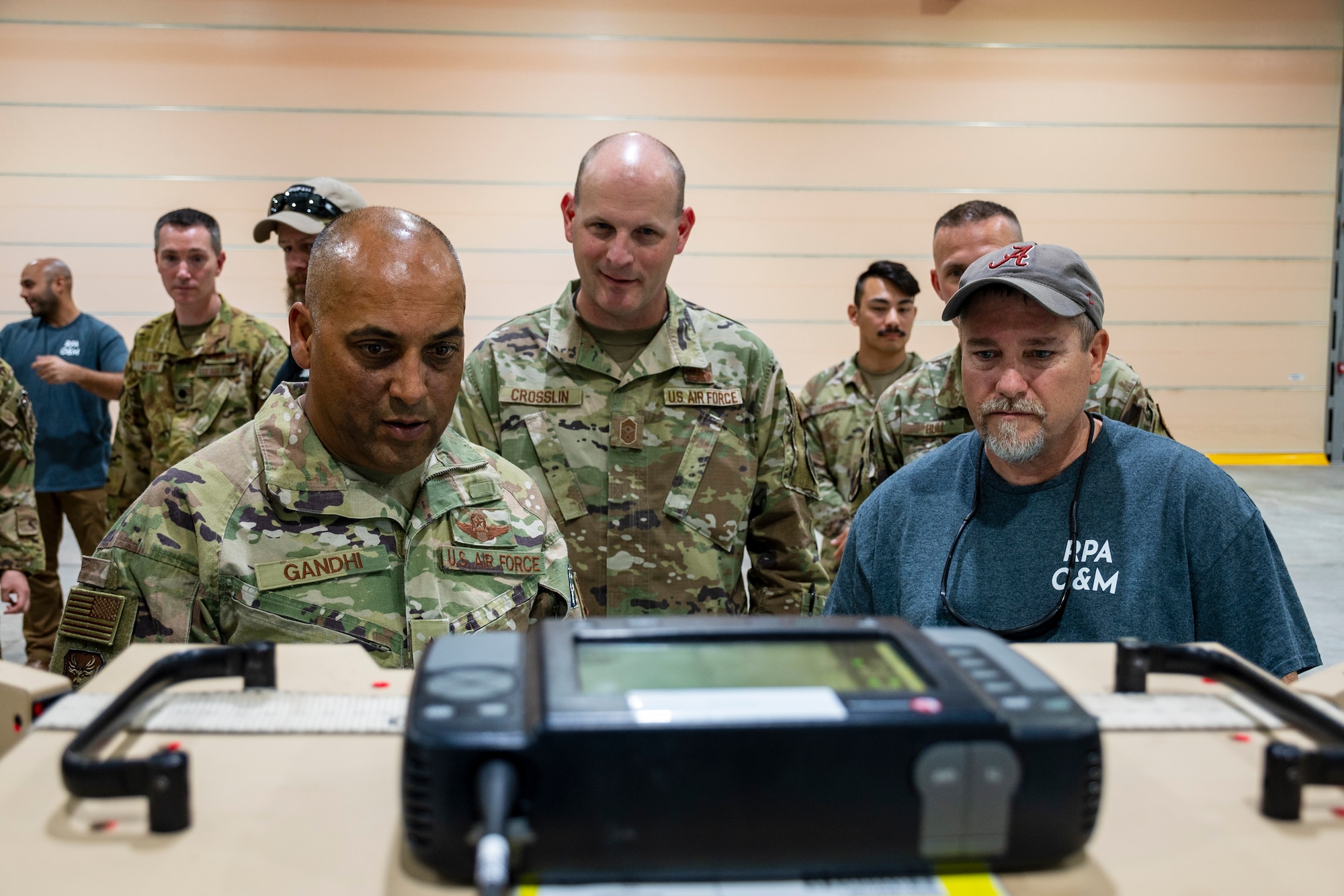 U.S. Air Force Brig. Gen. Akshai Gandhi, 378th Air Expeditionary Wing commander, visited the 46th Expeditionary Attack Squadron and reviewed ancillary data from MQ-9 aircraft while being briefed on Satellite Launch and Recovery (SLR) operations.