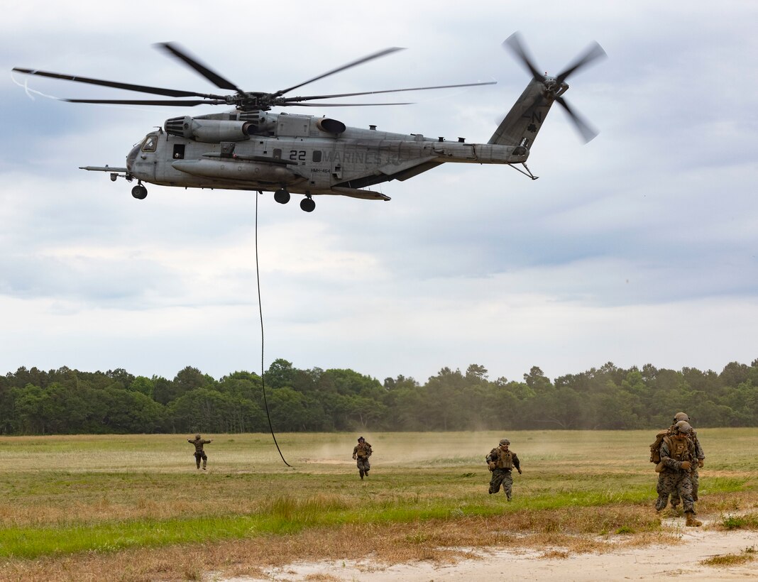 U.S. Marines with 2nd Air Naval Gunfire Liaison Company conduct fast roping with elements from the United Kingdom, Norway, Sweden, France, Netherlands, and Finland during exercise Burmese Chase aboard Marine Corps Base Camp Lejeune, North Carolina, May 17, 2023. Burmese Chase is an annual U.S. led, multi-lateral exercise that includes training on integration of ground and air fires, infantry tactics and naval gunfire alongside NATO allies and partners. (U.S. Marine Corps photo by Lance Cpl. John Allen)
