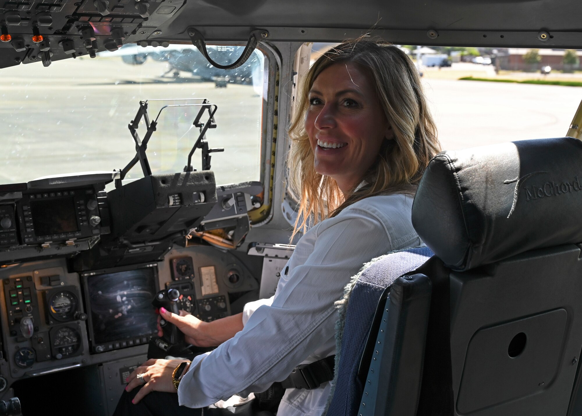 A member of the Military Impacted Schools Association sits in the cockpit of a C-17 Globemaster III at Joint Base Lewis-McChord, Washington, June 27, 2023. MISA is a national organization of school superintendents whose mission is to serve school districts with a high concentration of military children. MISA works on funding, legislation, partnerships and programs for military families on the move. Members visited JBLM and were given a mission brief from U.S. Air Force Col. David Morales, 62d Airlift Wing vice commander, and toured a C-17. (U.S. Air Force photo by Senior Airman Callie Norton)